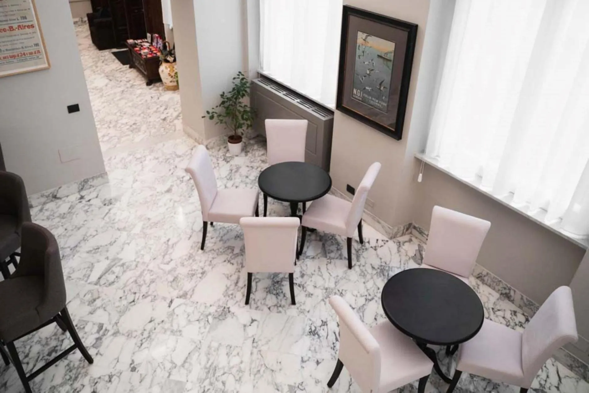 Communal lounge/ TV room in Hotel De Ville