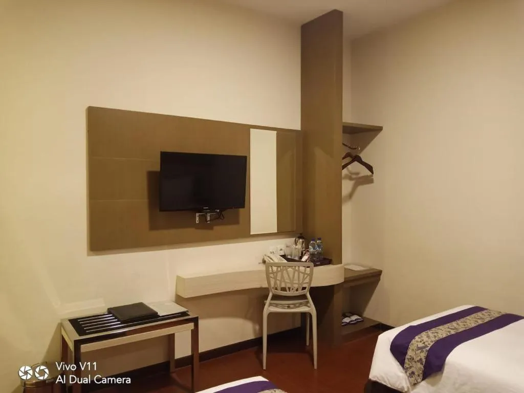 Bed in Hotel City View