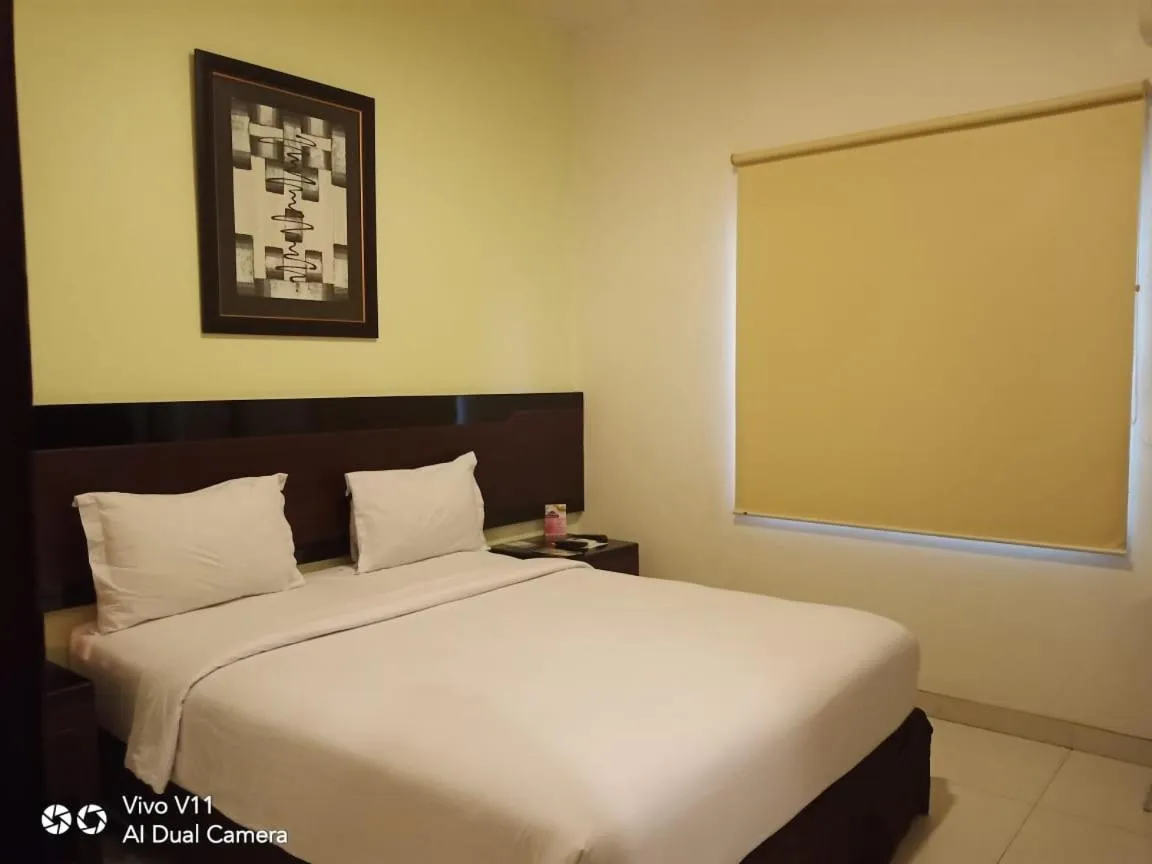 Bed in Hotel City View