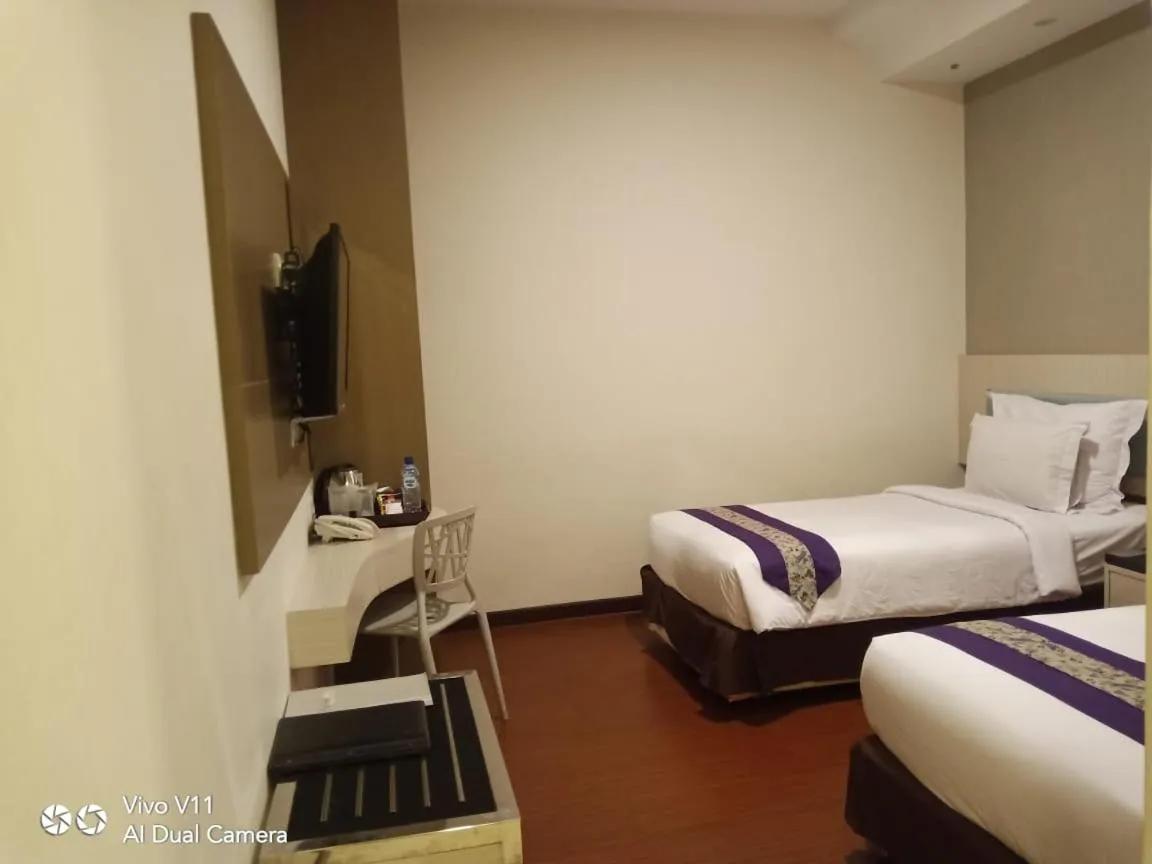 Bed in Hotel City View