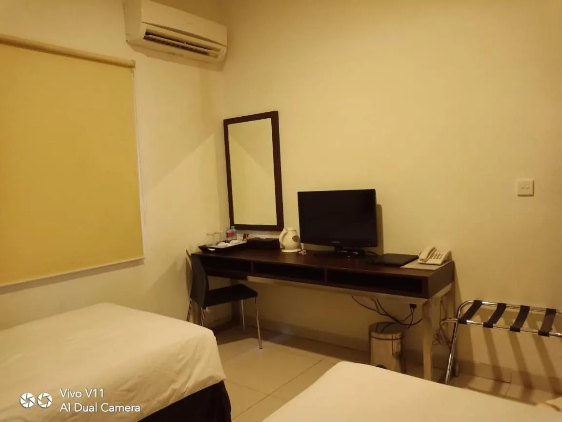 Bed in Hotel City View