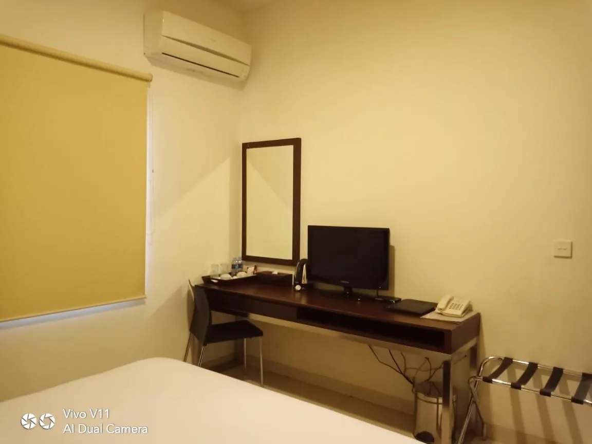 Bed in Hotel City View