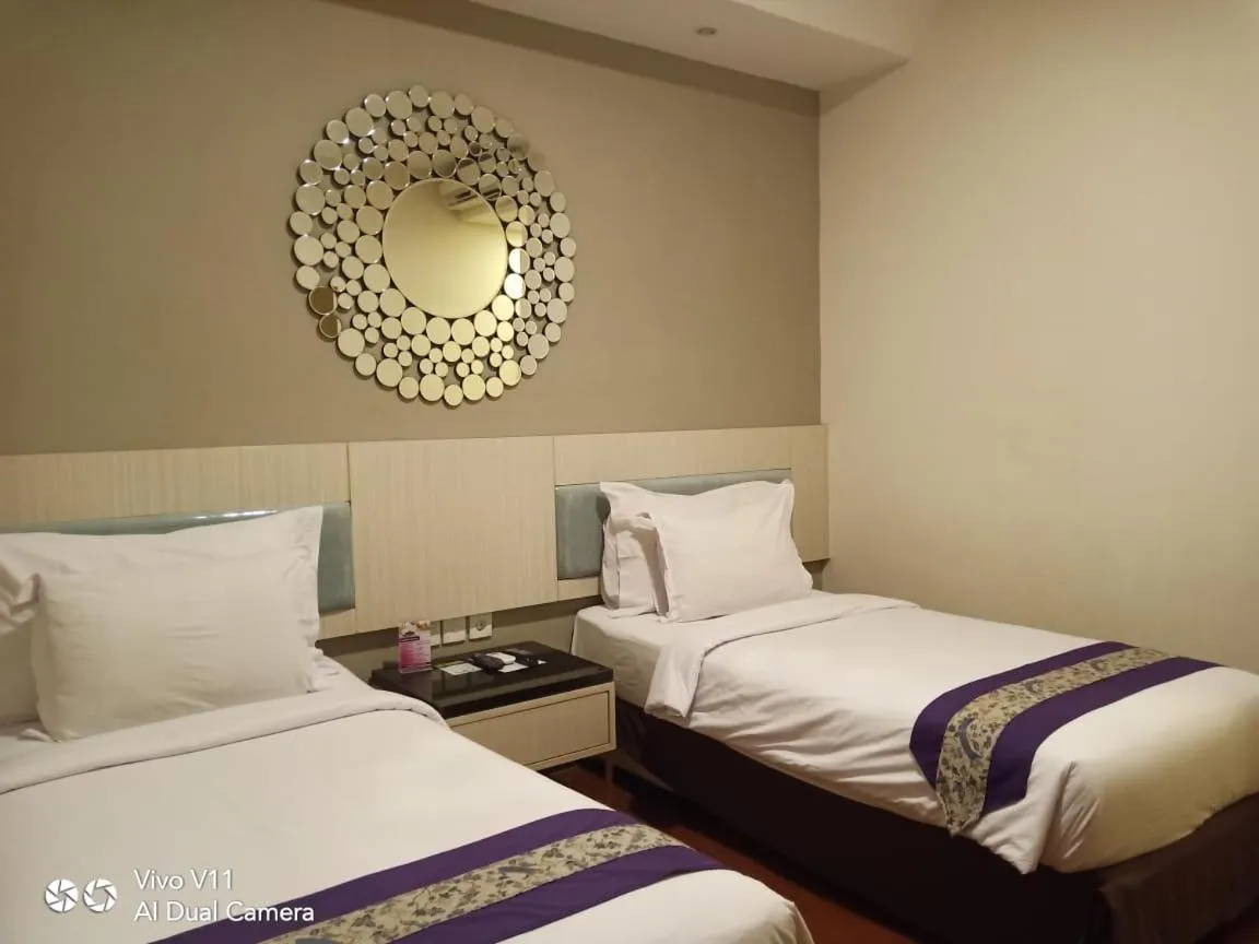 Bed in Hotel City View