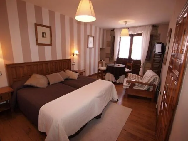 Photo of the whole room, Bed in Posada Santa Juliana