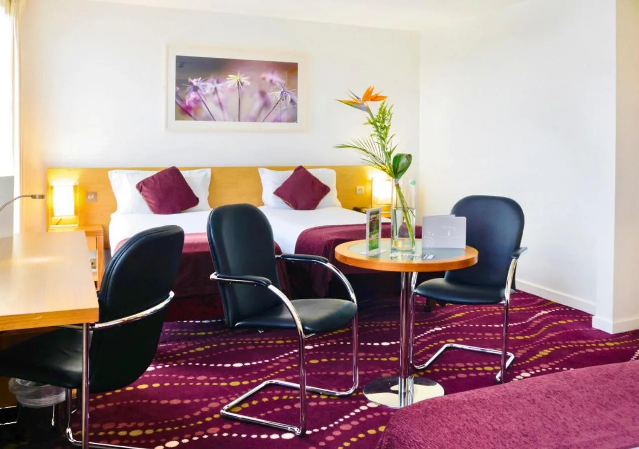 Bedroom in Louis Fitzgerald Hotel