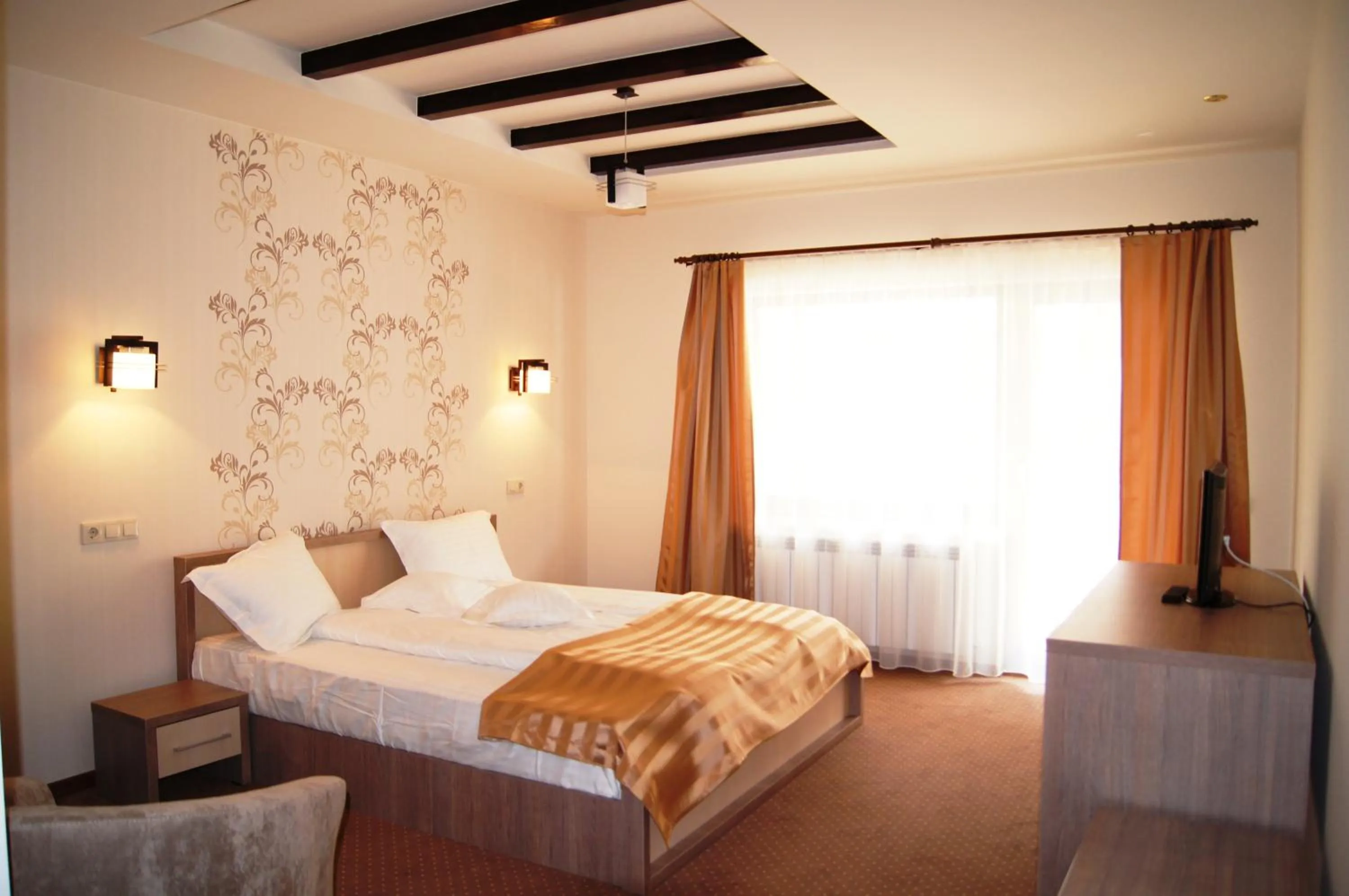 Photo of the whole room, Bed in Pensiunea JOJO2