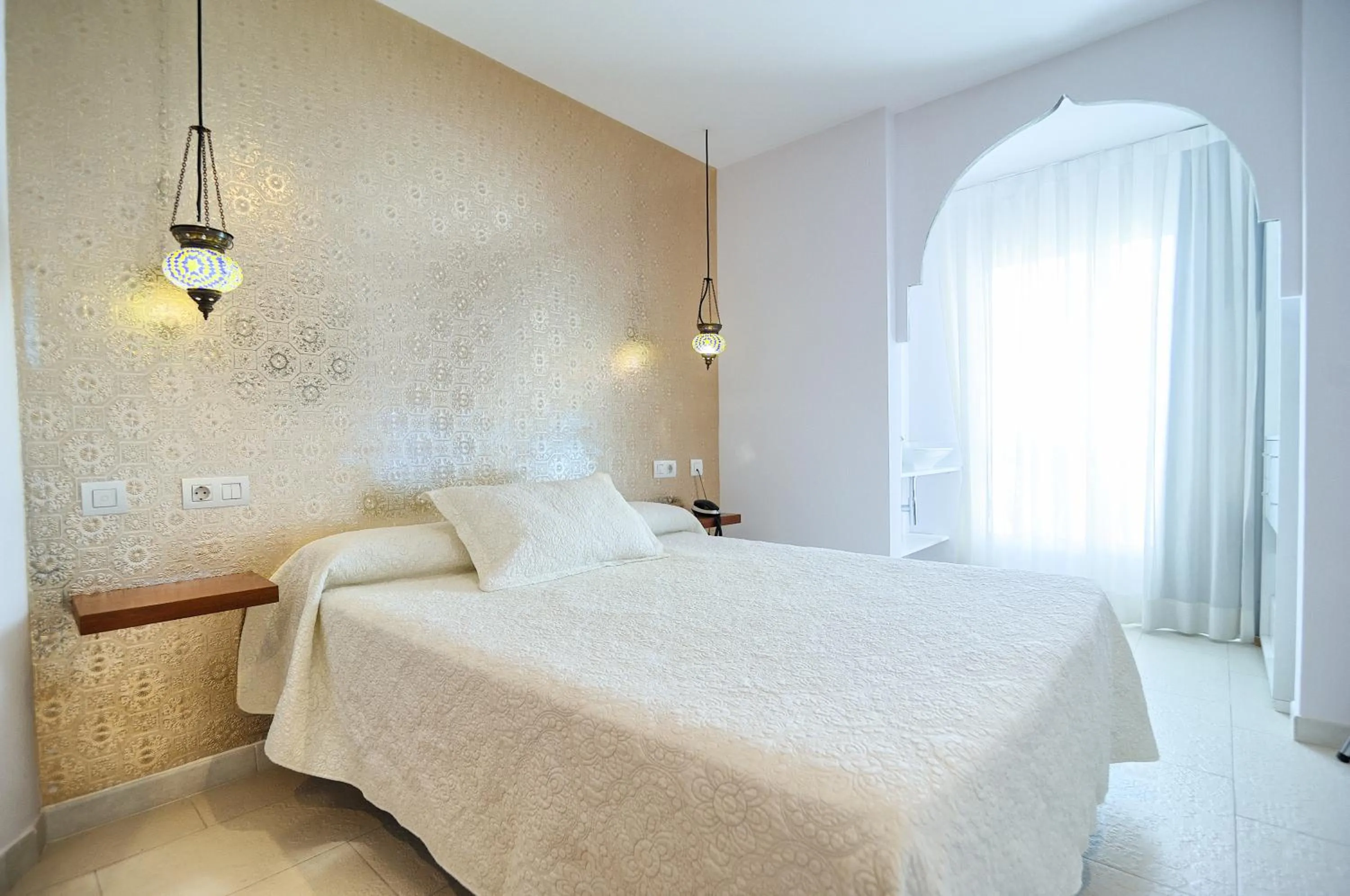 Photo of the whole room, Bed in Hotel Boutique Sabbia Valencia