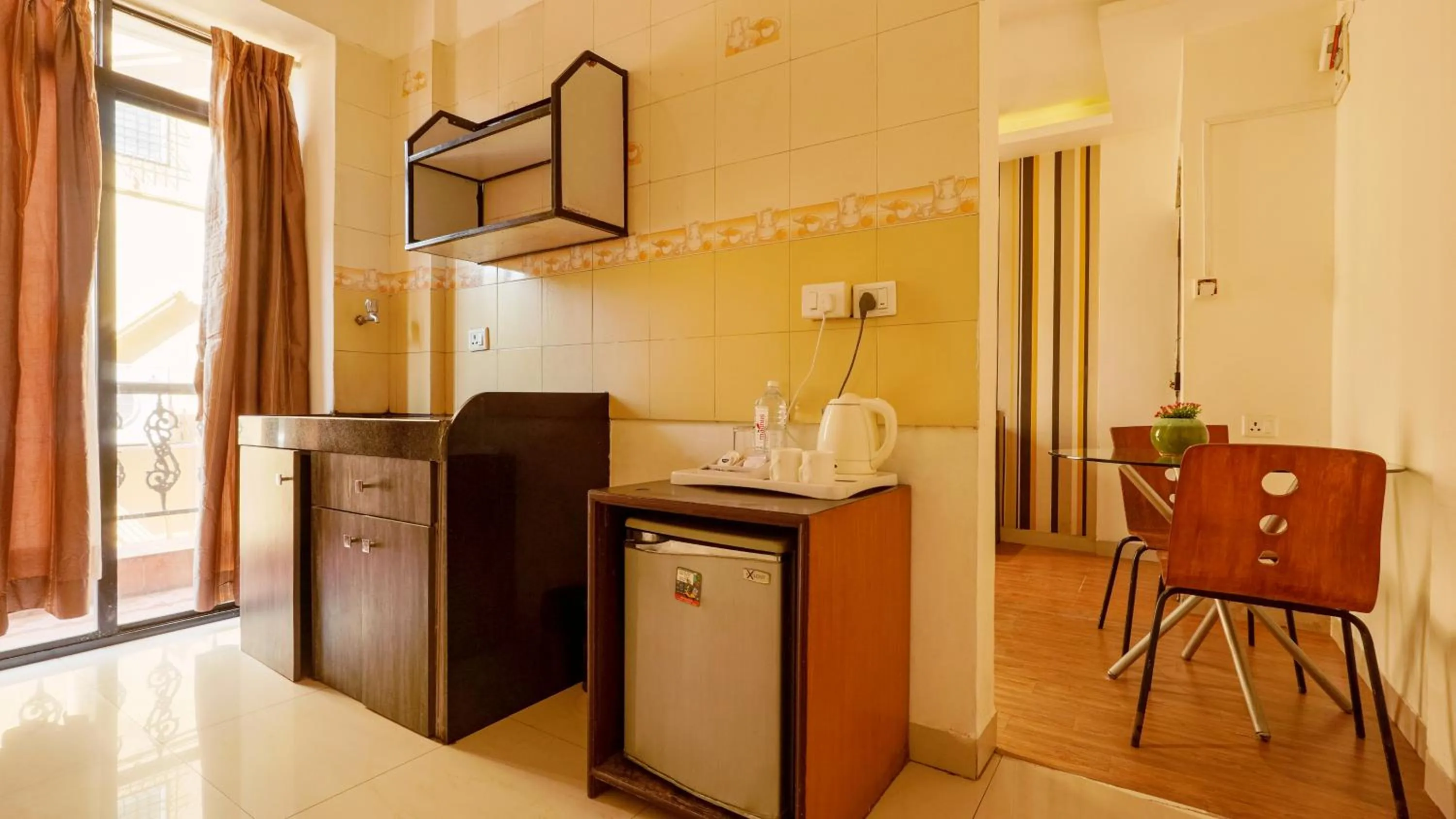 Kitchen or kitchenette in Magnus Calypso Suites Viman Nagar
