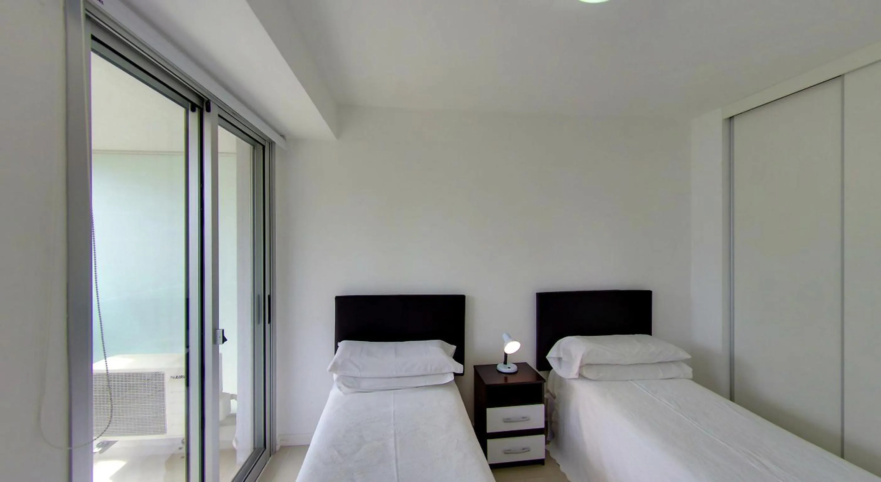 Decorative detail, Bed in Arenas del Mar Apartments