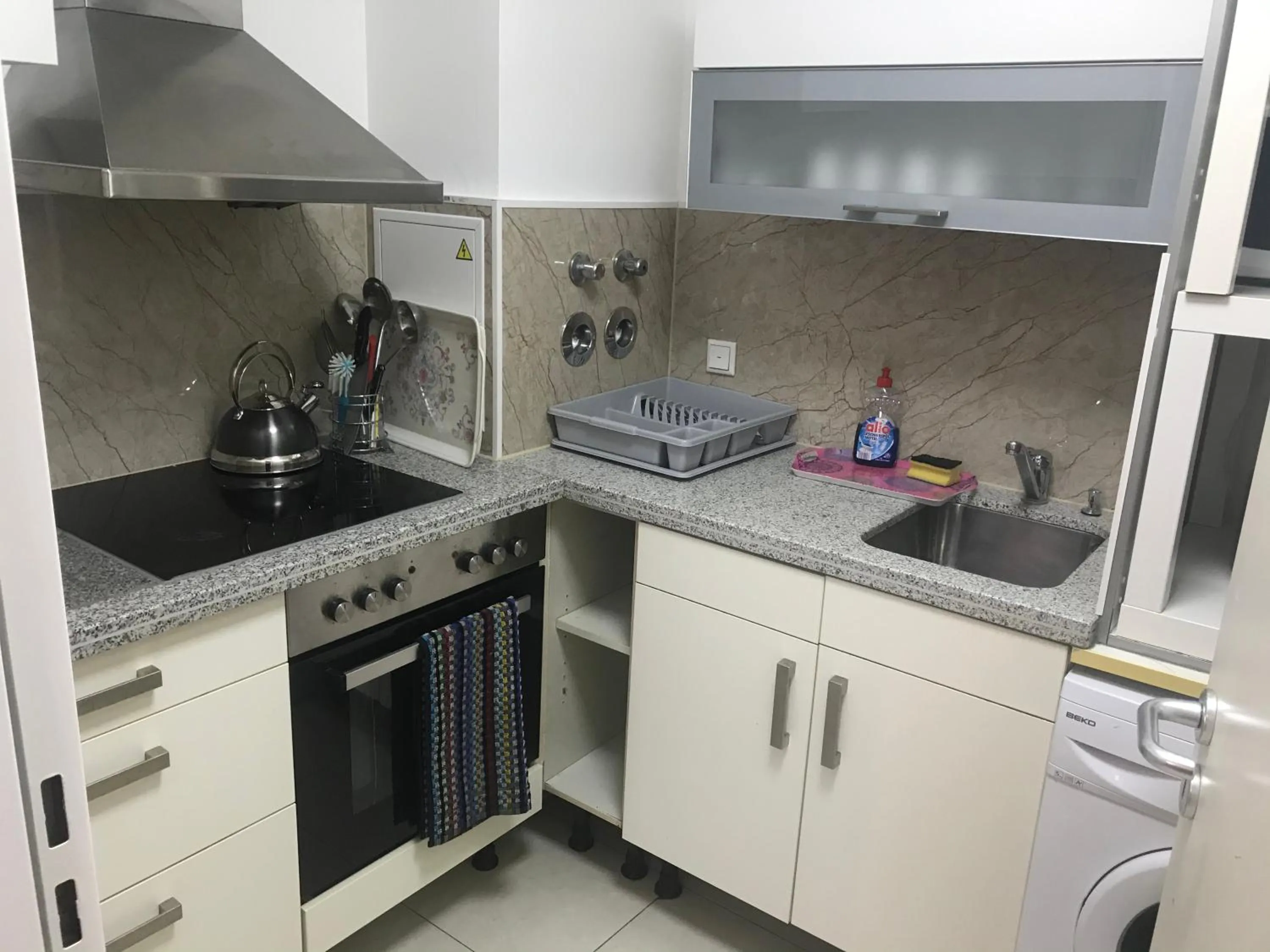 Kitchen or kitchenette in Baynunah Suites Aparthotel