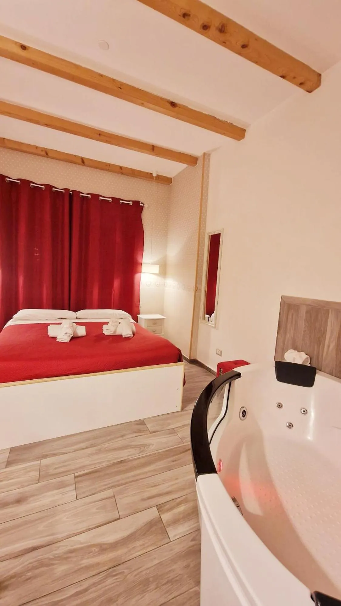 Photo of the whole room, Bed in Il Mare Di Roma Luxury