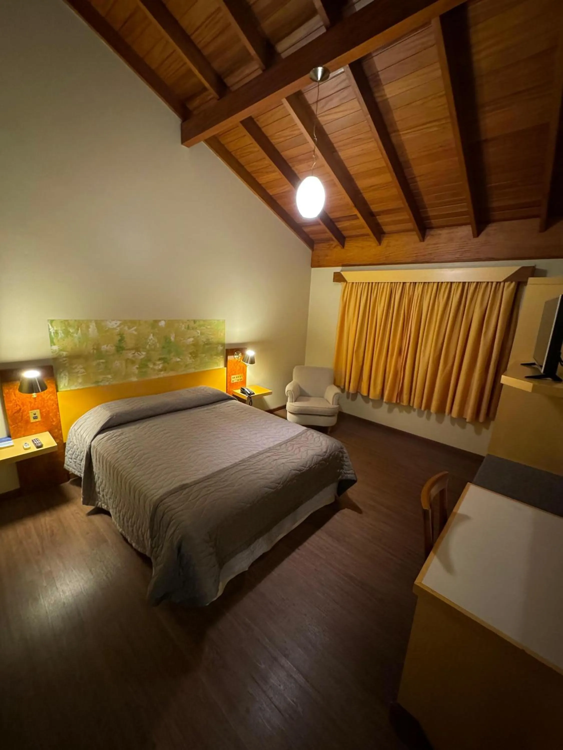 Bed in Pousada Vovó Carolina