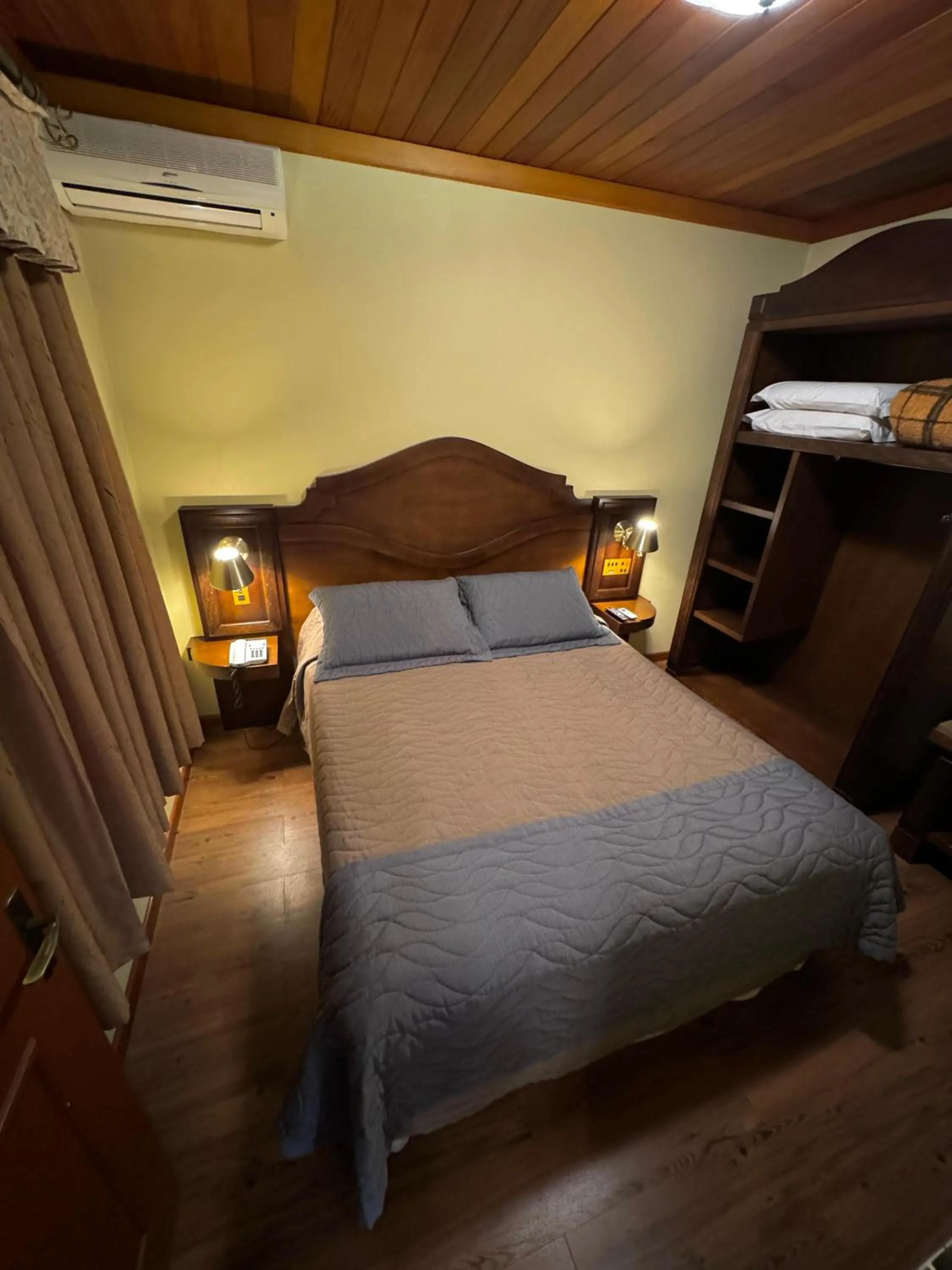 Bed in Pousada Vovó Carolina