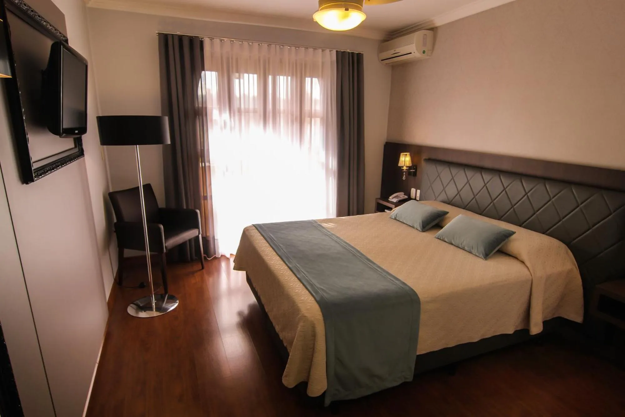 Bed in Pousada Vovó Carolina