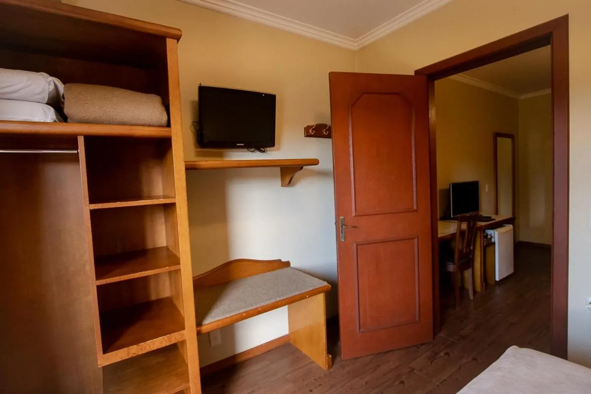 Bed in Pousada Vovó Carolina