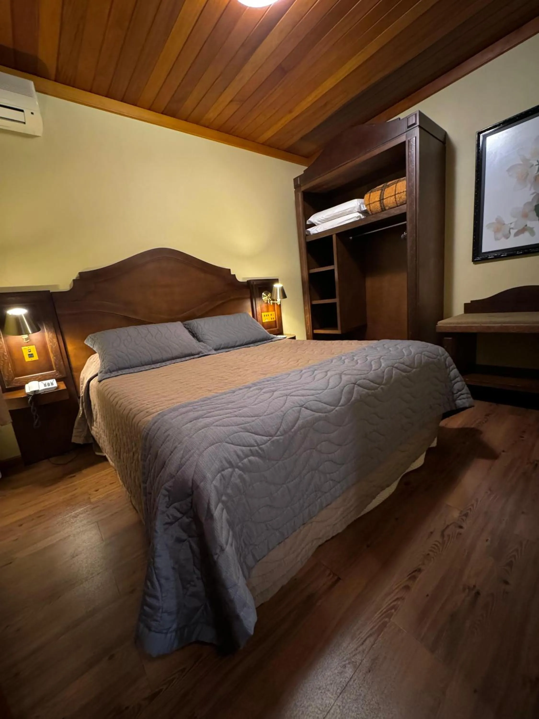 Bed in Pousada Vovó Carolina