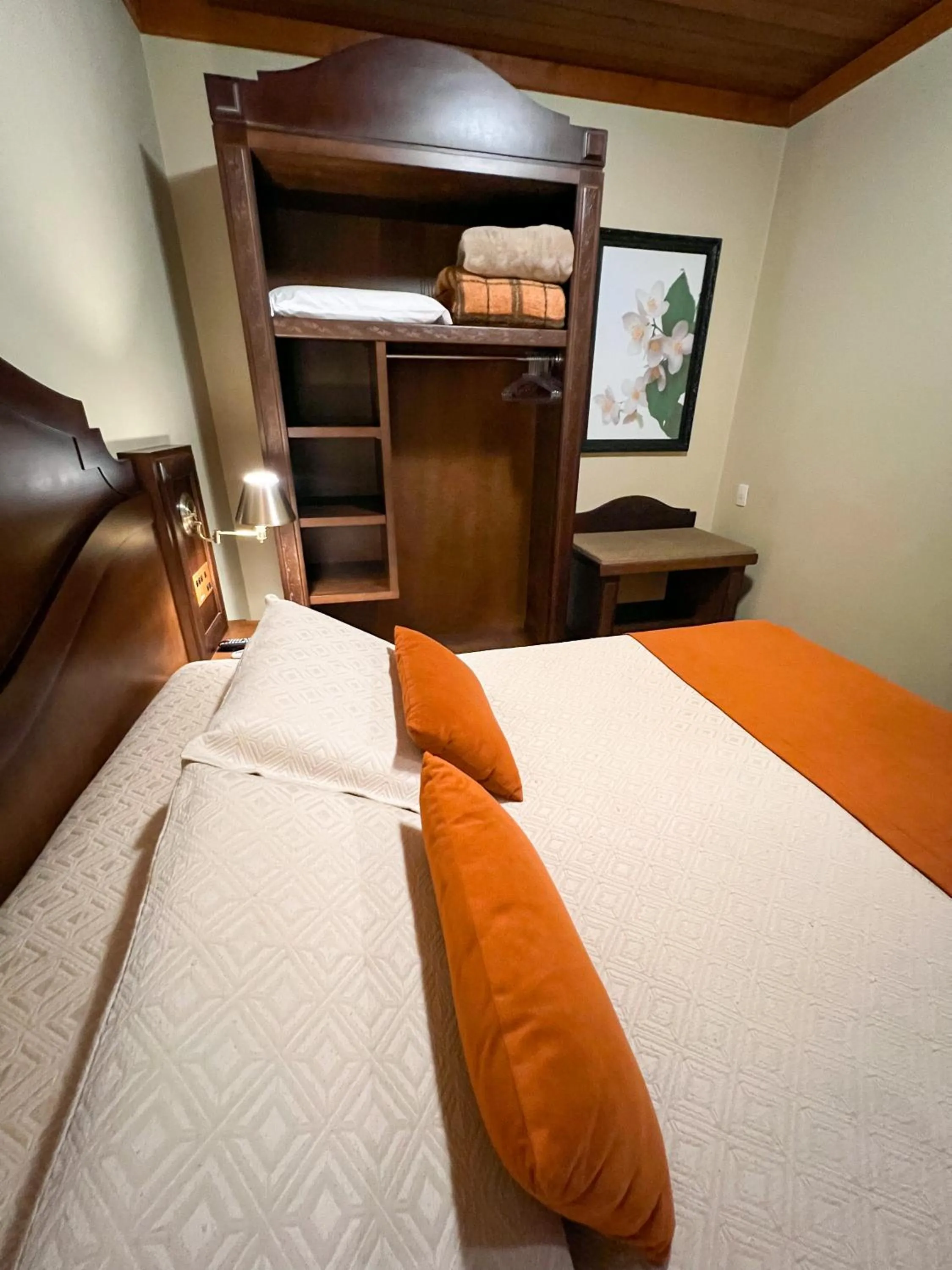 Bed in Pousada Vovó Carolina