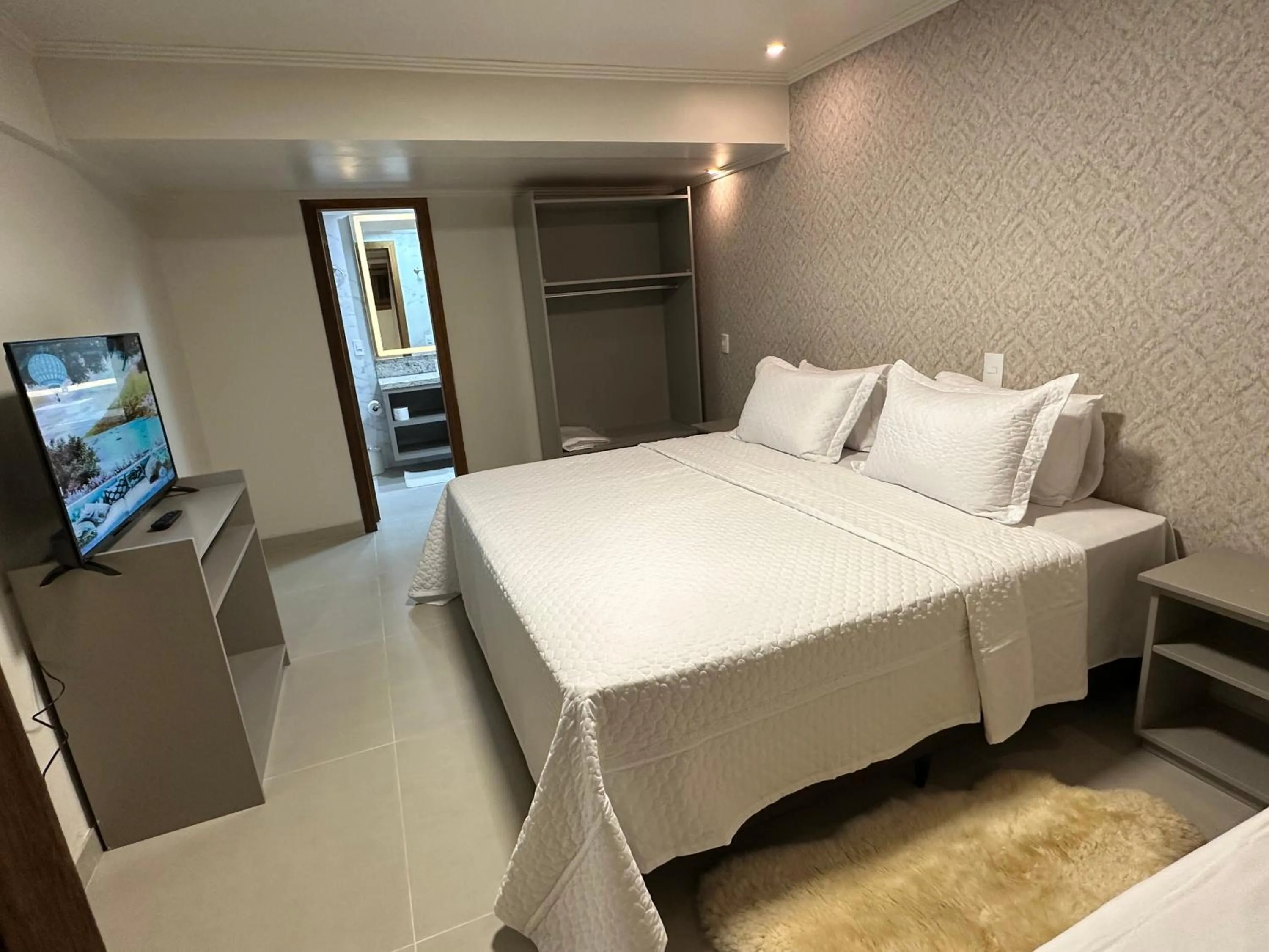 Bed in Pousada Villa Verde