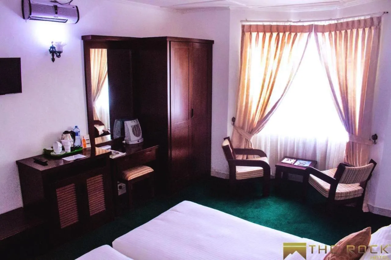 Bed in The Rock Hotel