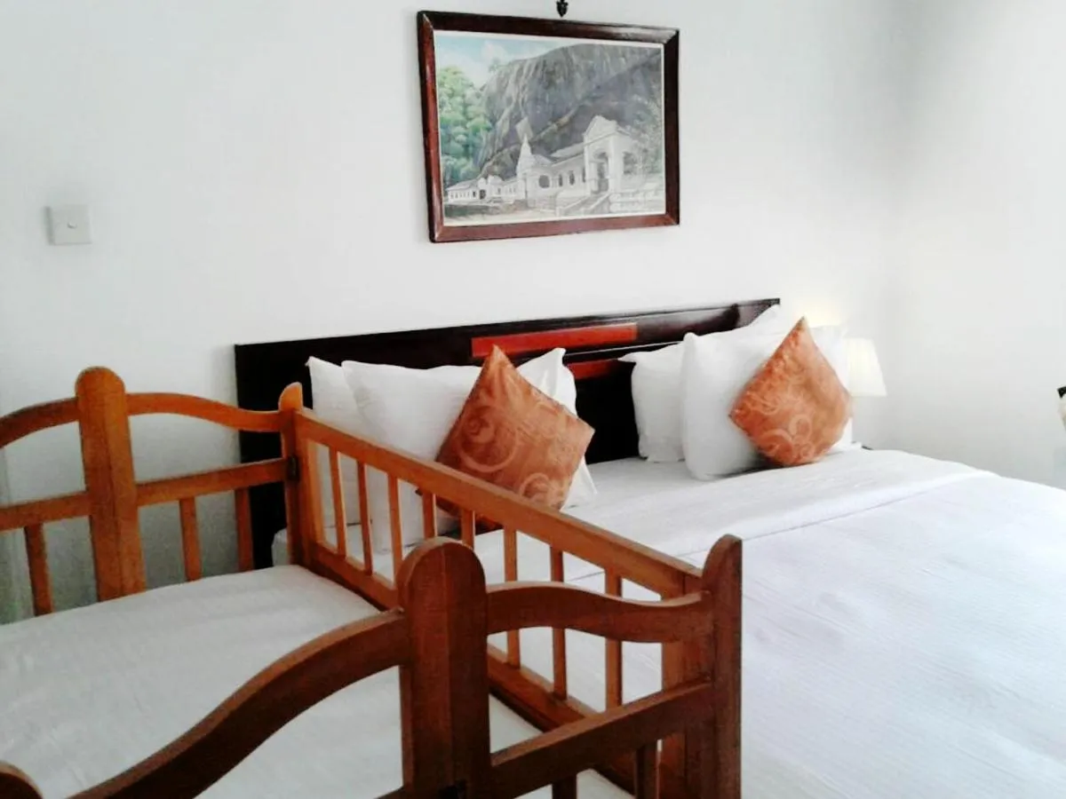 Bed in The Rock Hotel