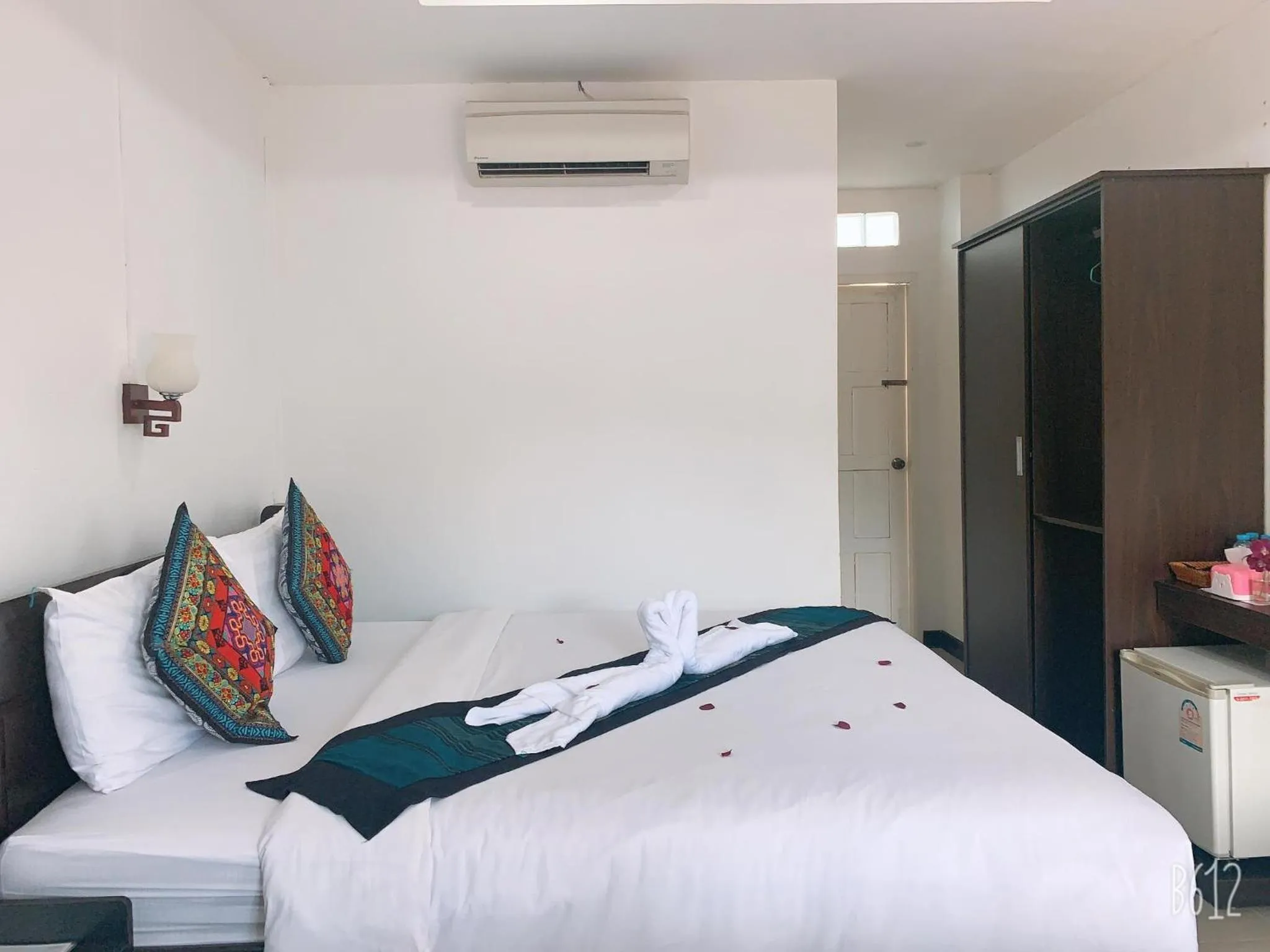 Bed in Jasmine Vangvieng Hotel