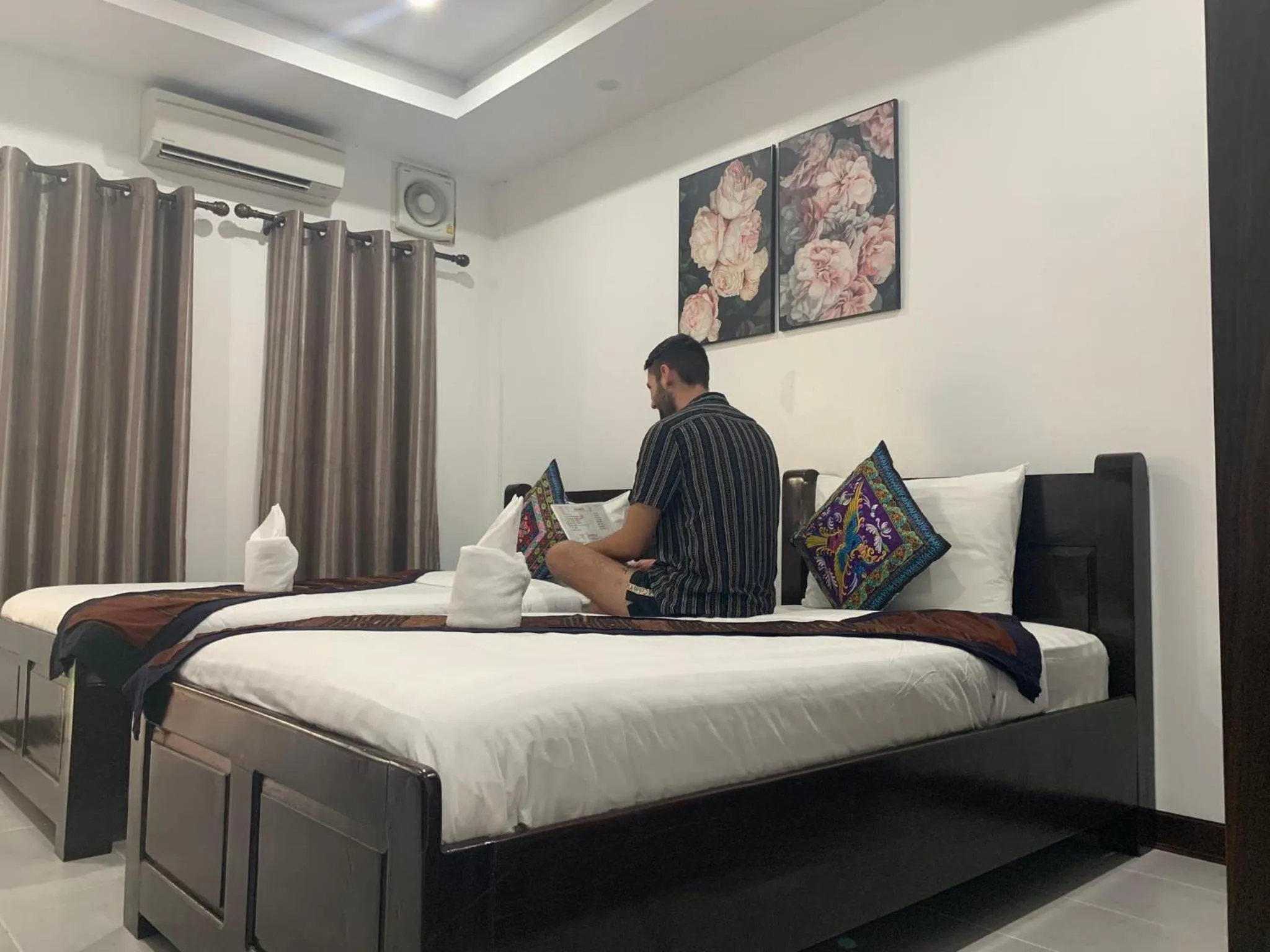 Bed in Jasmine Vangvieng Hotel