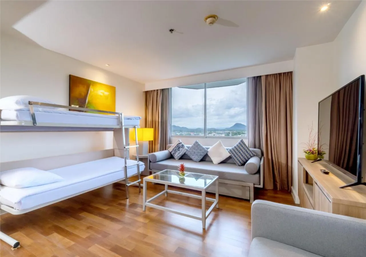 Living room, Bed in Radisson Resort & Spa Hua Hin