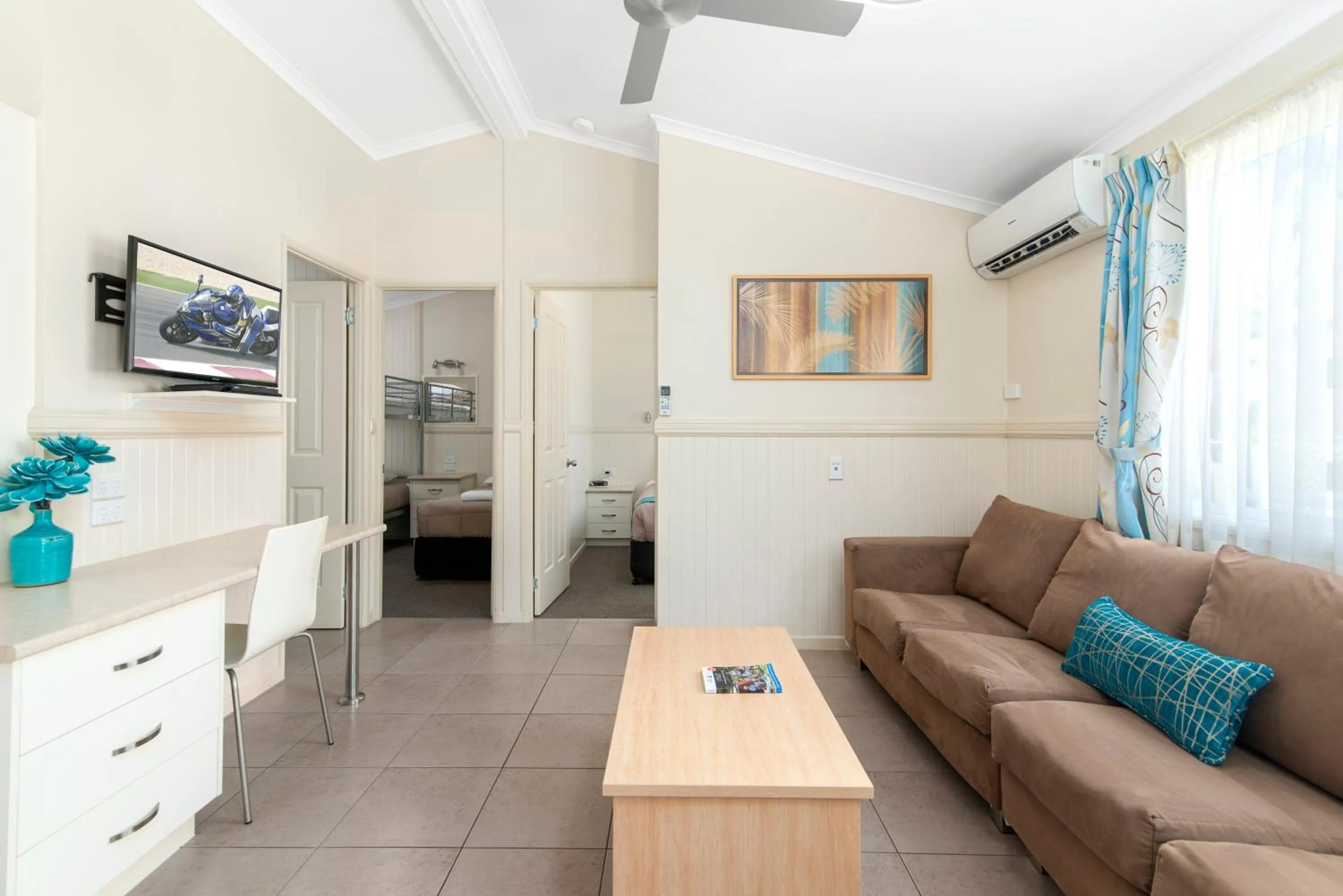 Living room in Ashmore Palms Holiday Village