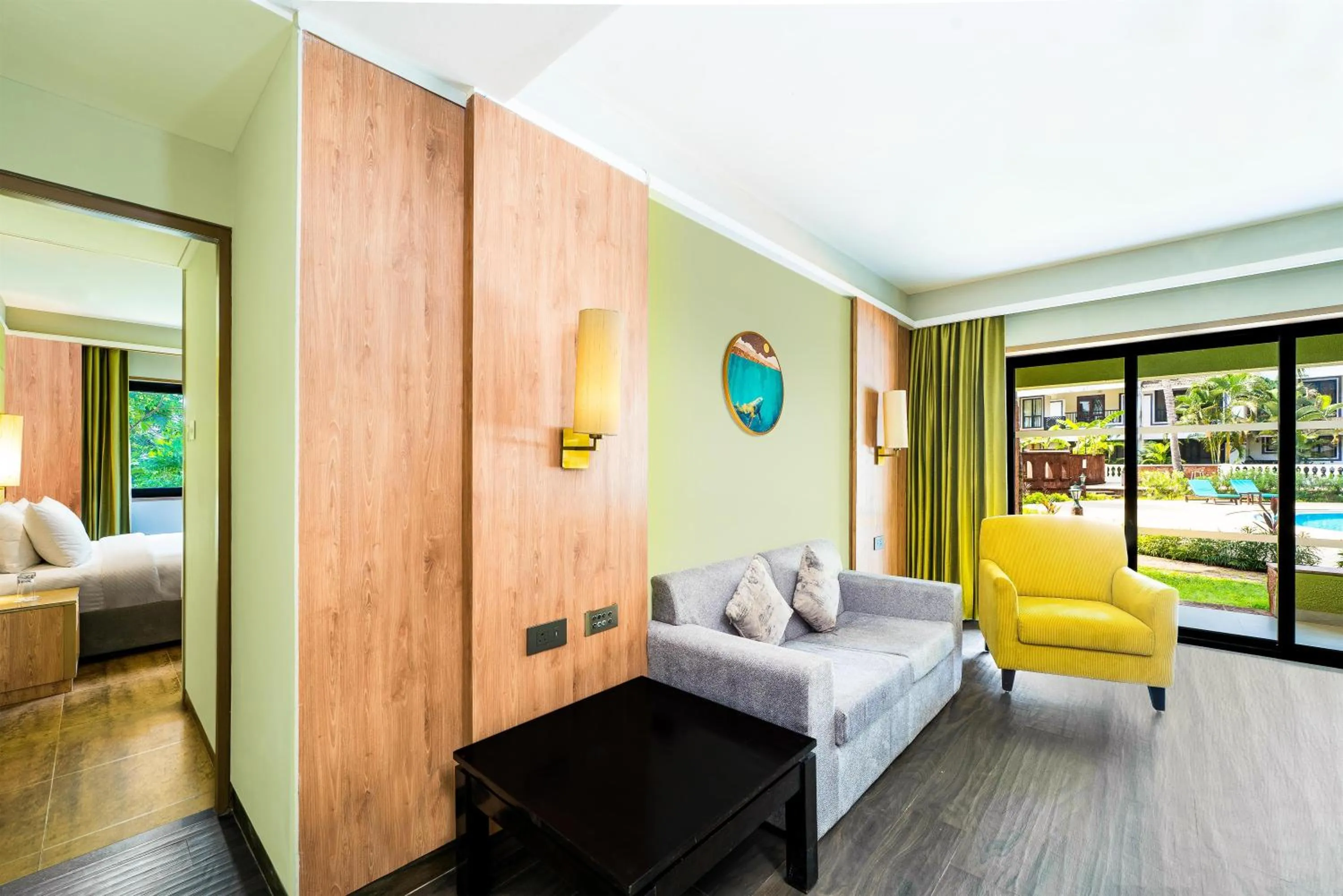 Living room, Bed in DoubleTree by Hilton Hotel Goa - Arpora - Baga