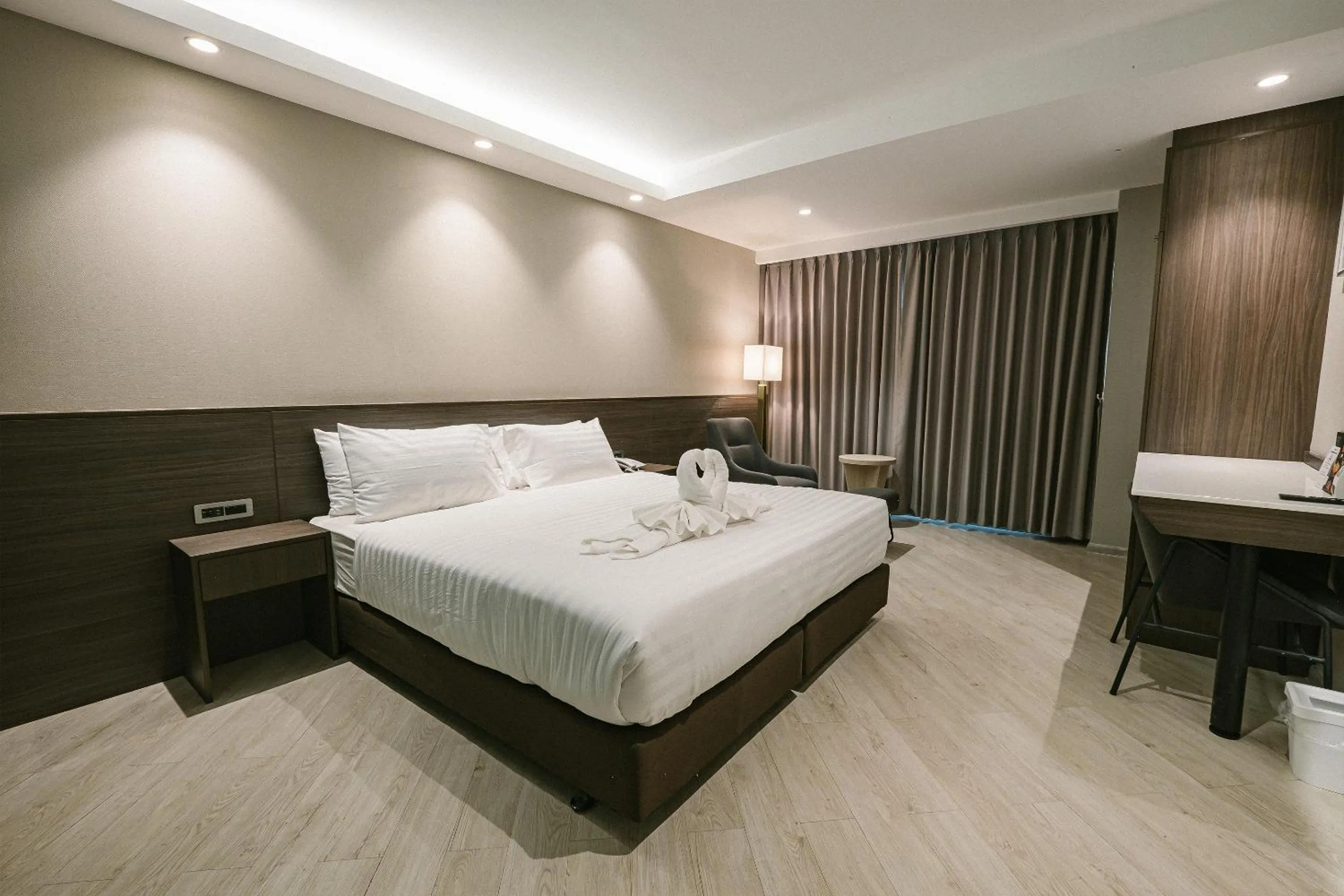 Bed in The Rich Hotel