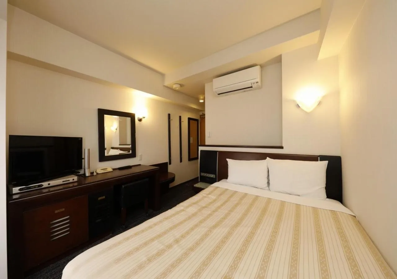 Photo of the whole room, Bed in Hotel Blion Naha