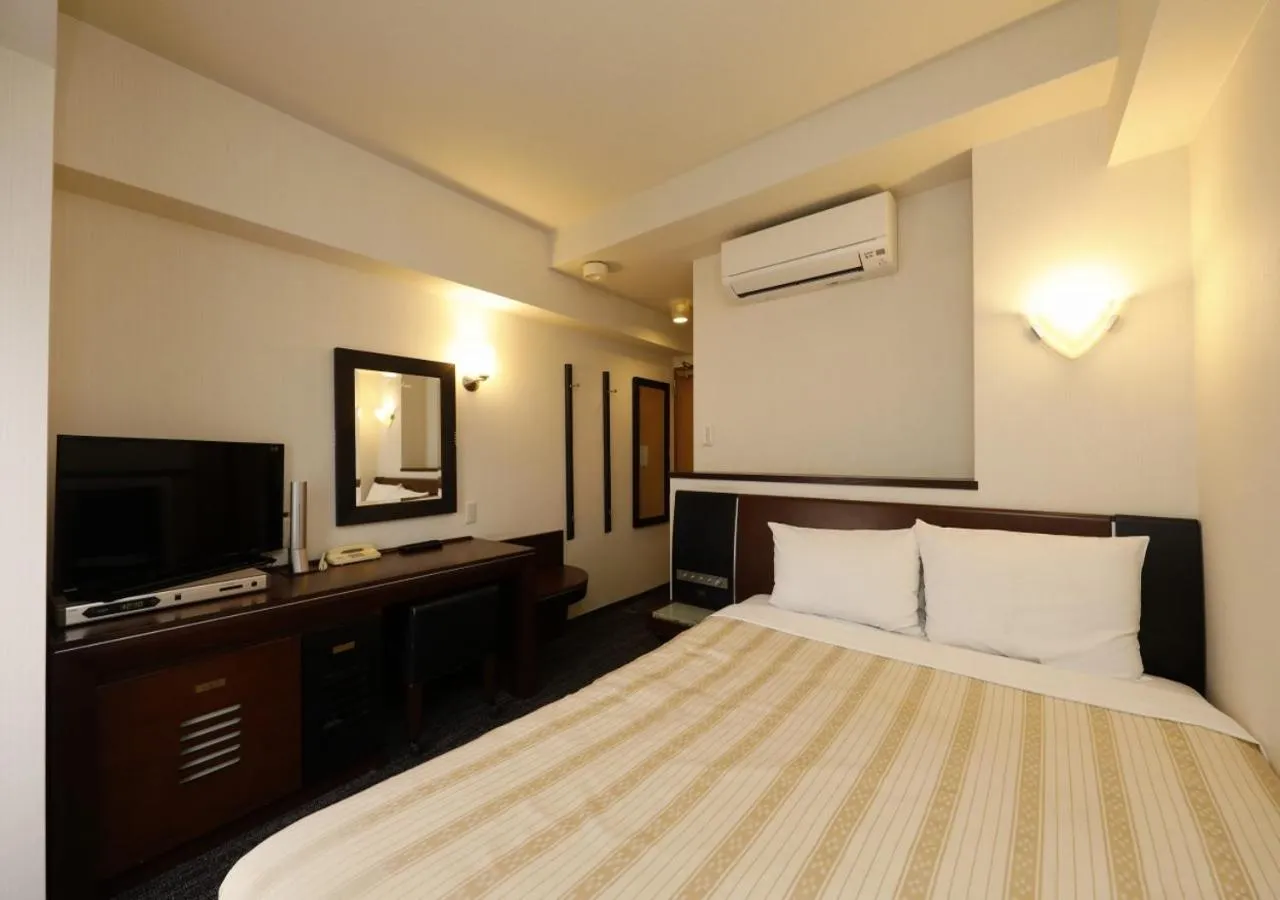 Photo of the whole room, Bed in Hotel Blion Naha