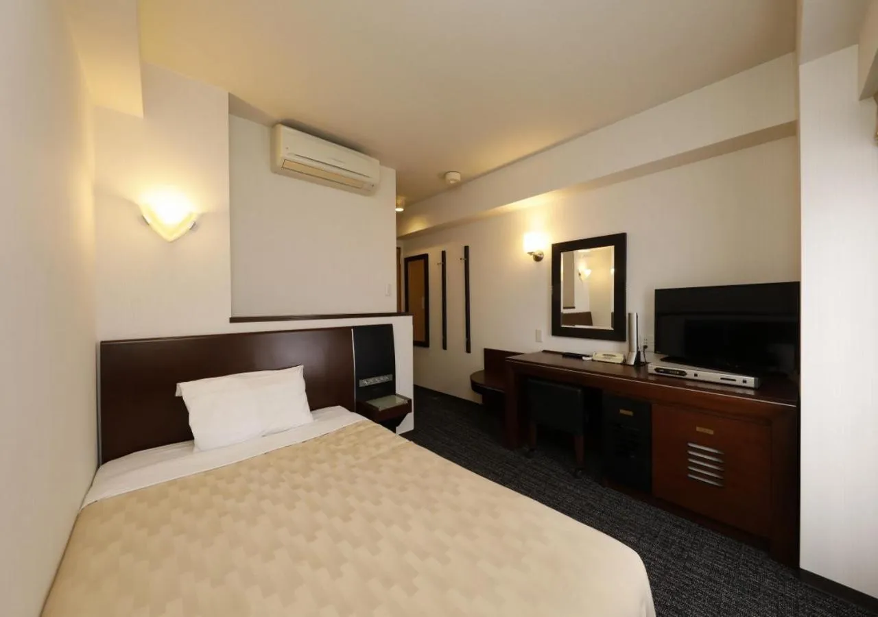 Photo of the whole room, Bed in Hotel Blion Naha