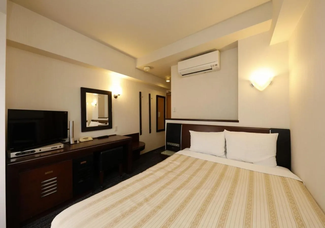 Photo of the whole room, Bed in Hotel Blion Naha