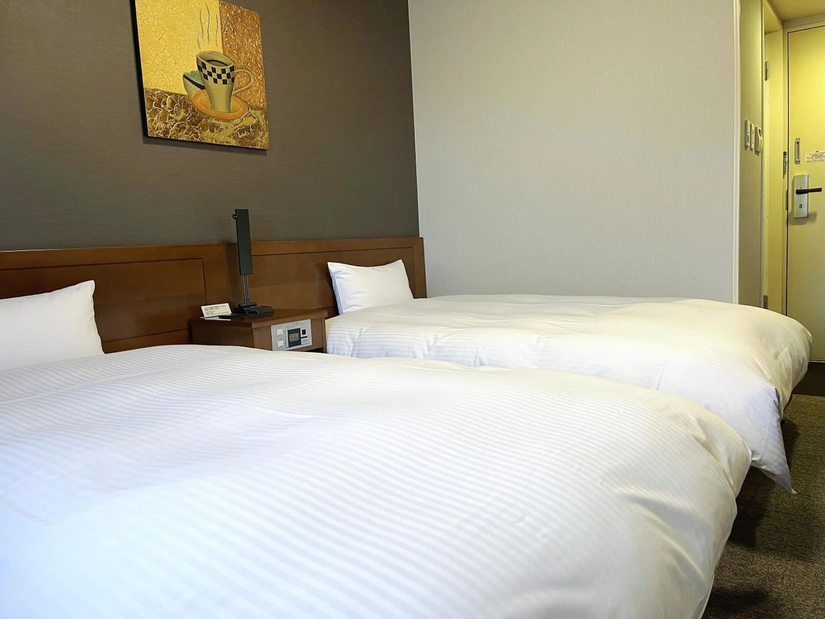 Photo of the whole room, Bed in Hotel Route-Inn Sendaiko Kita Inter