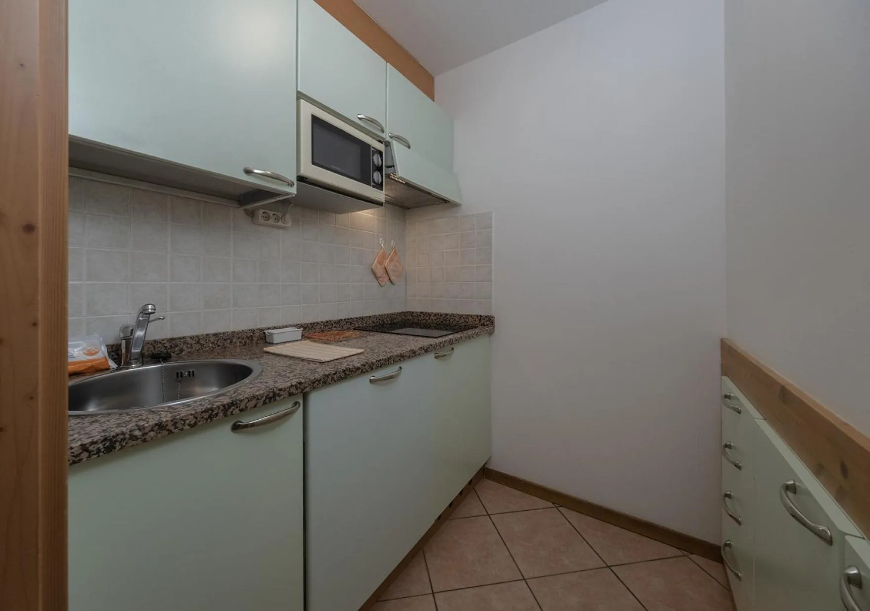 Kitchen or kitchenette in Residence Kristall- Fiemme Holidays