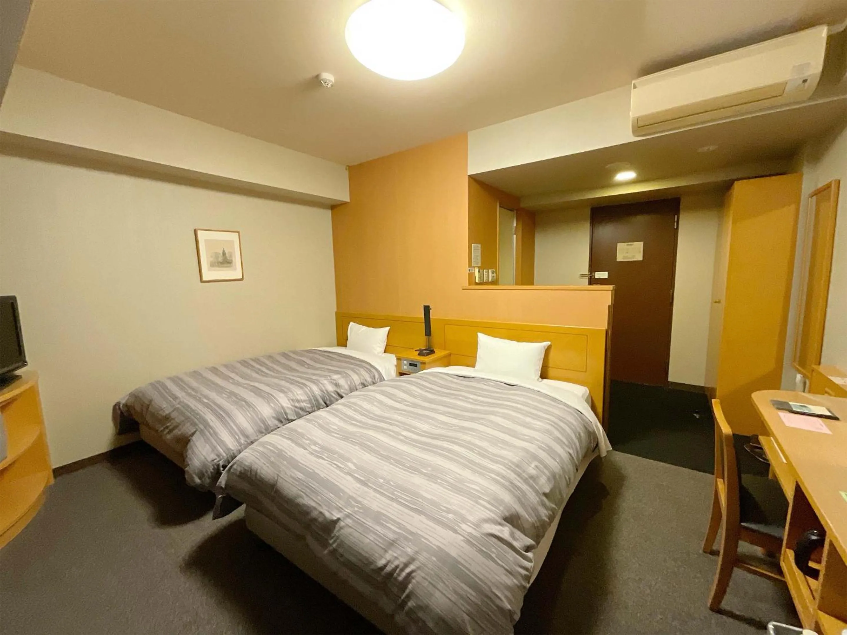 Photo of the whole room, Bed in Hotel Route-Inn Aizuwakamatsu