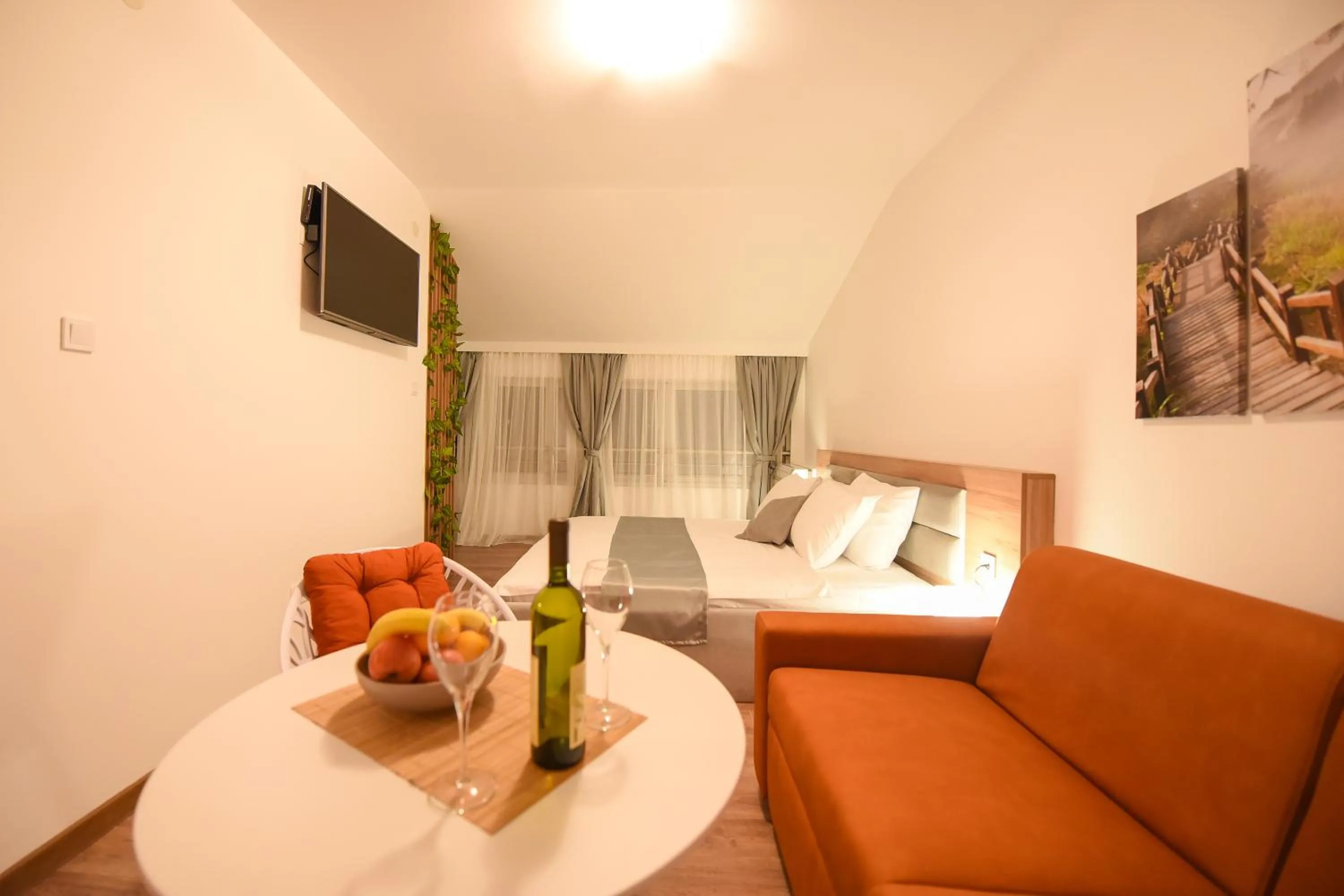 Seating area, Bed in Korzo apartmani