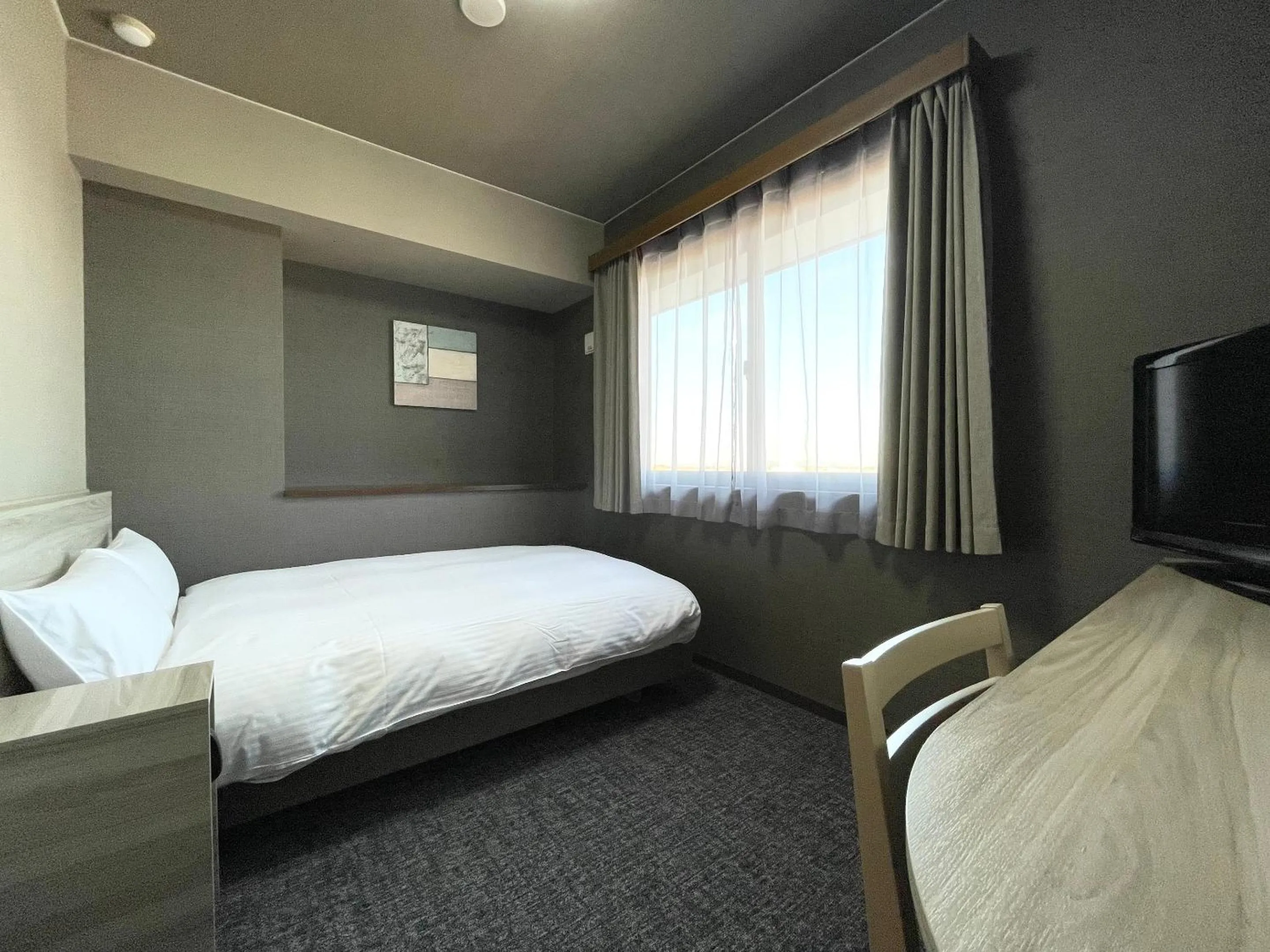 Photo of the whole room, Bed in Hotel Route-Inn Yuki