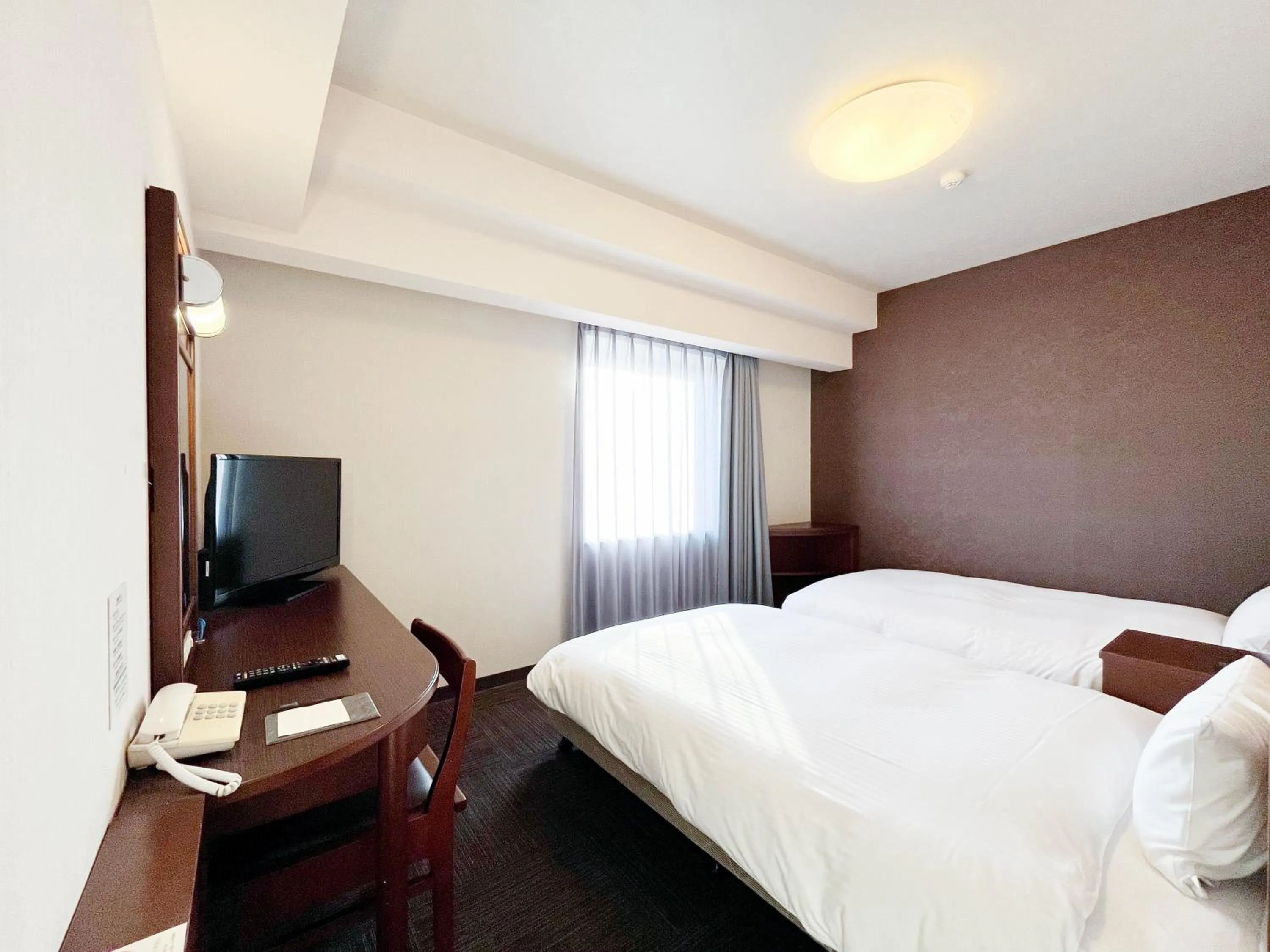 Photo of the whole room, Bed in Hotel Route-Inn Koriyama Minami