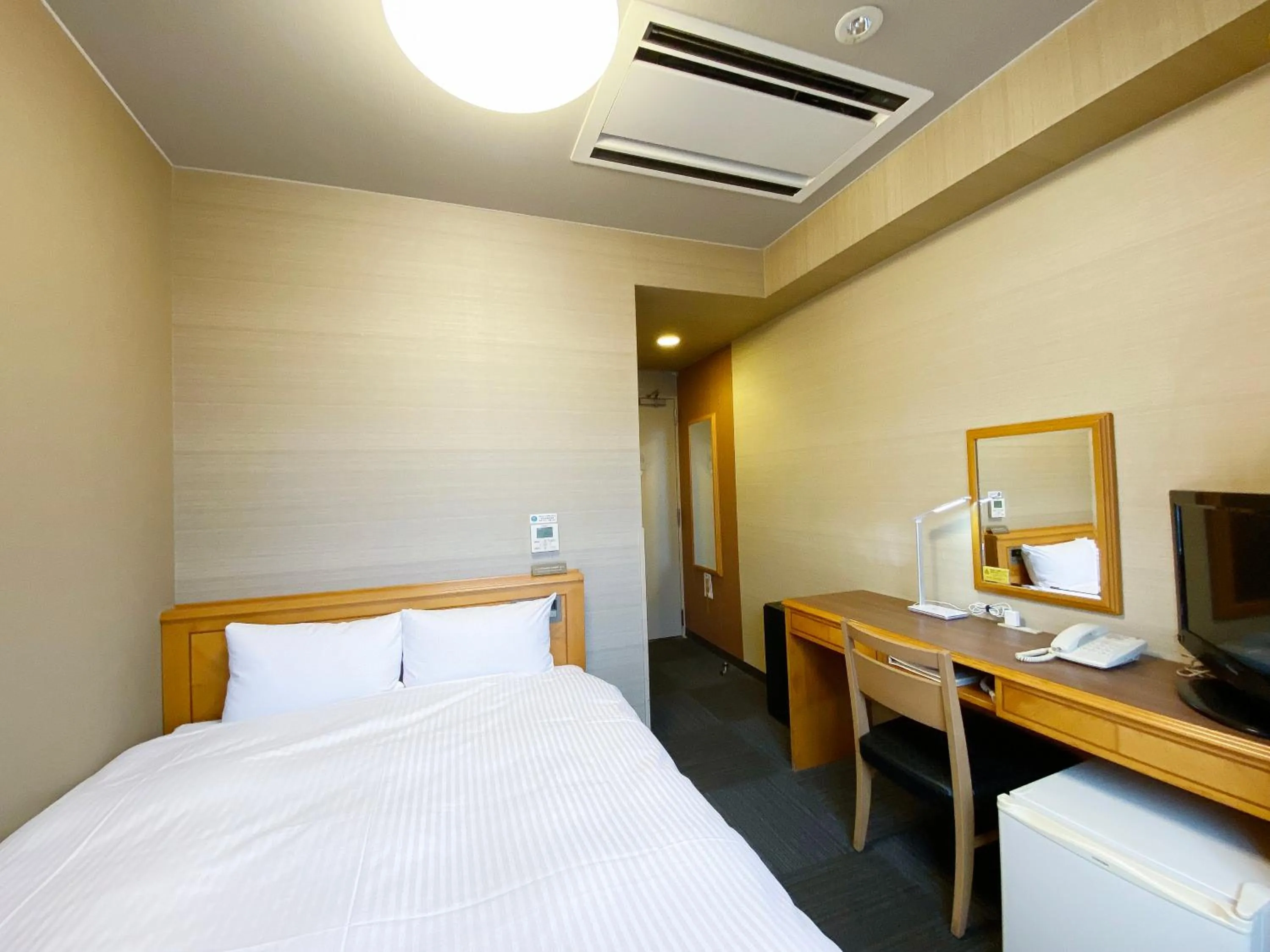 Photo of the whole room, Bed in Hotel Route-Inn Shin-Shirakawa Eki Higashi