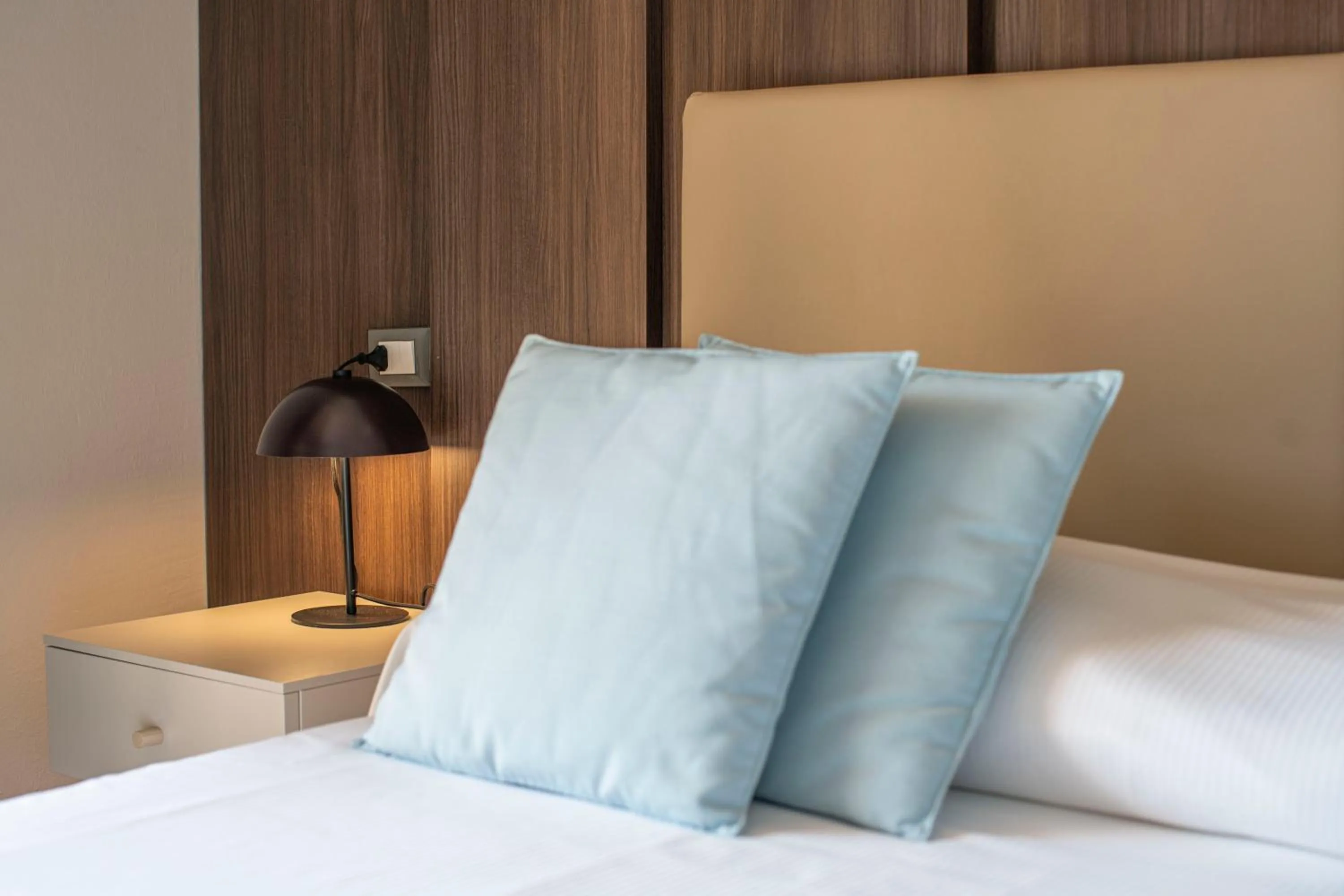 Bed in Hotel Riva del Sole