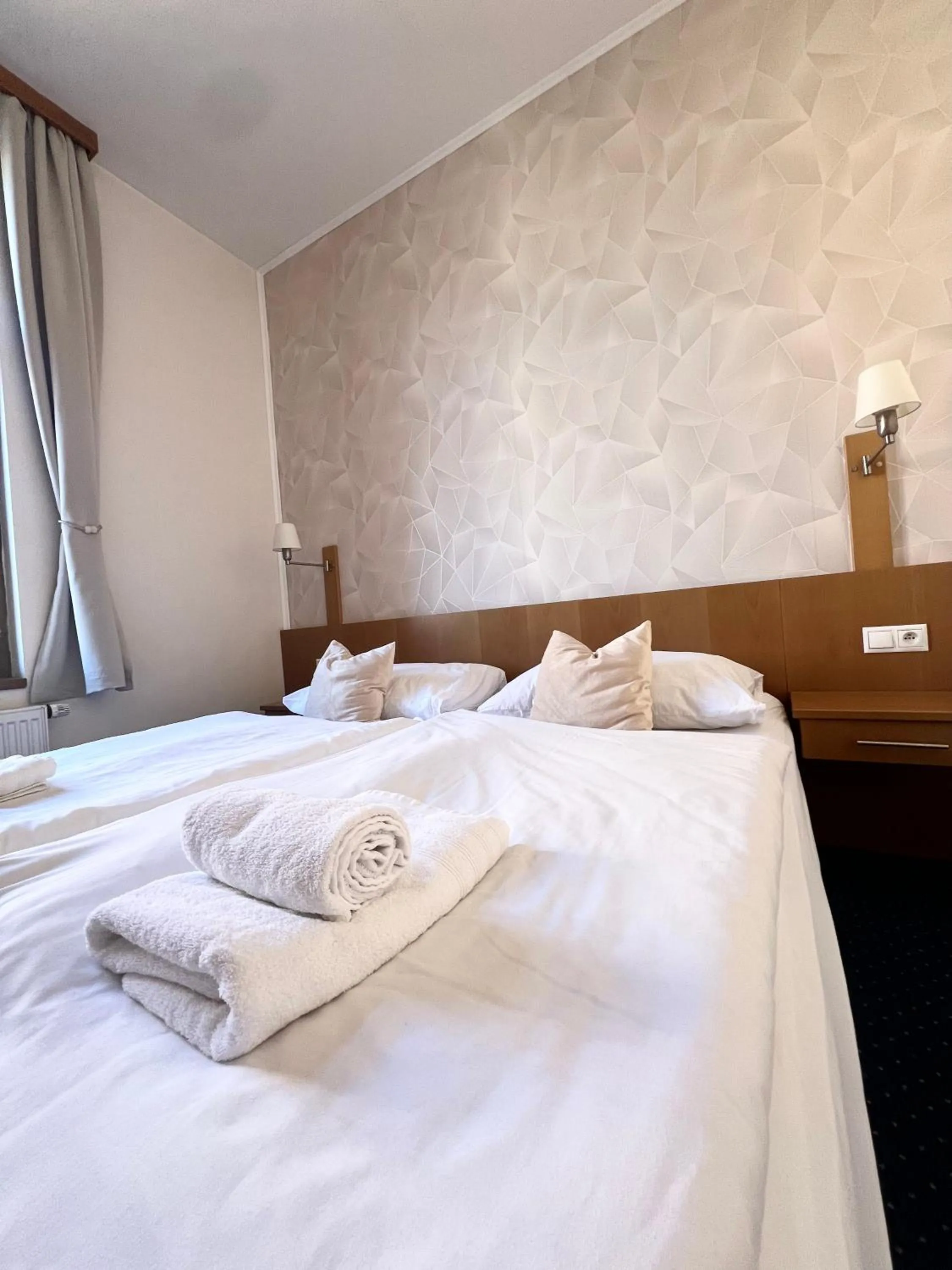 Bed in Hotel Apollon