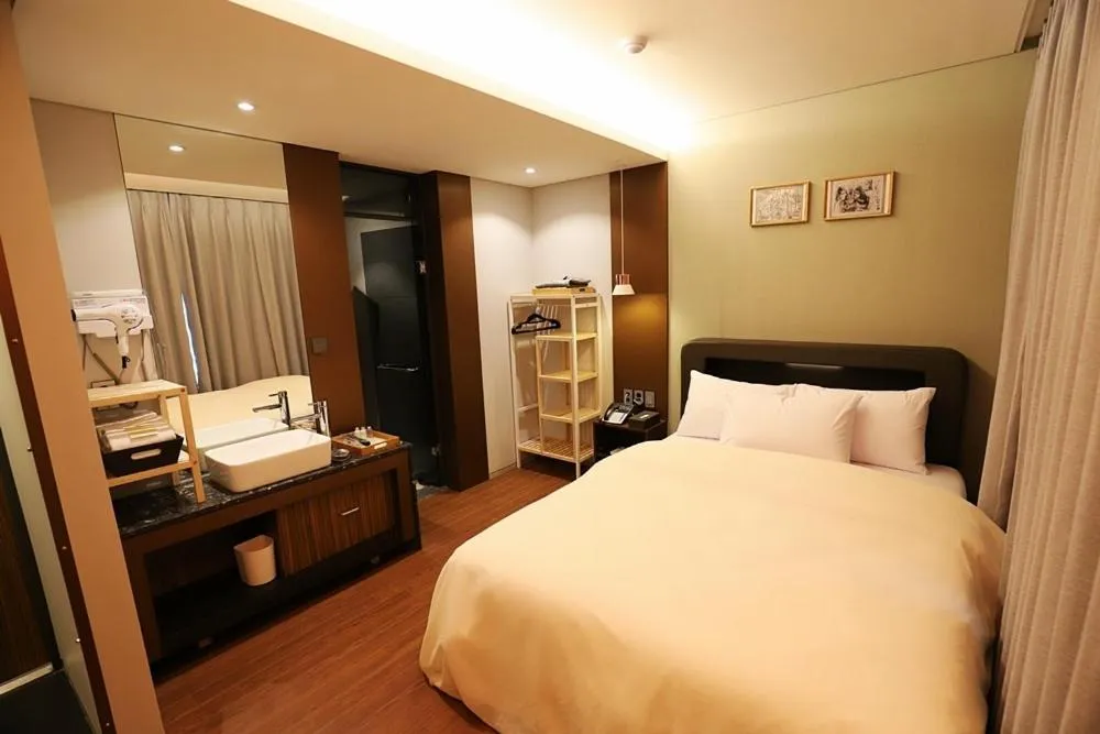 Bed in Namyangju Bukhangang dolcecasa hotel