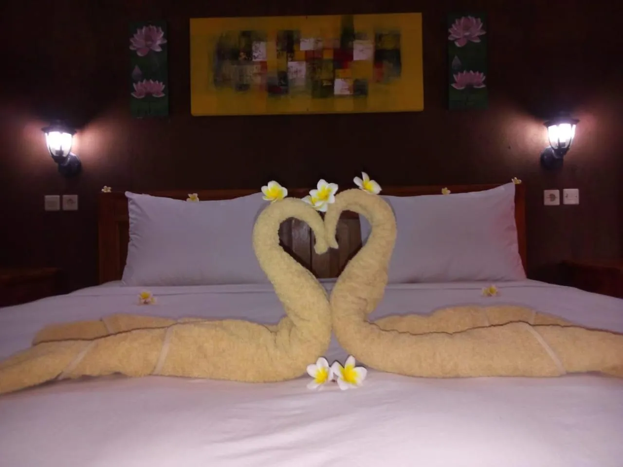 Bed in Eliska Sari Bungalows Sumberkima