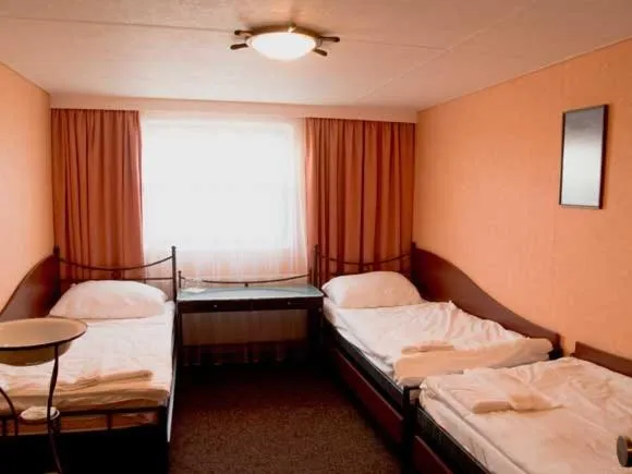 Photo of the whole room, Bed in Hotel Kormorán