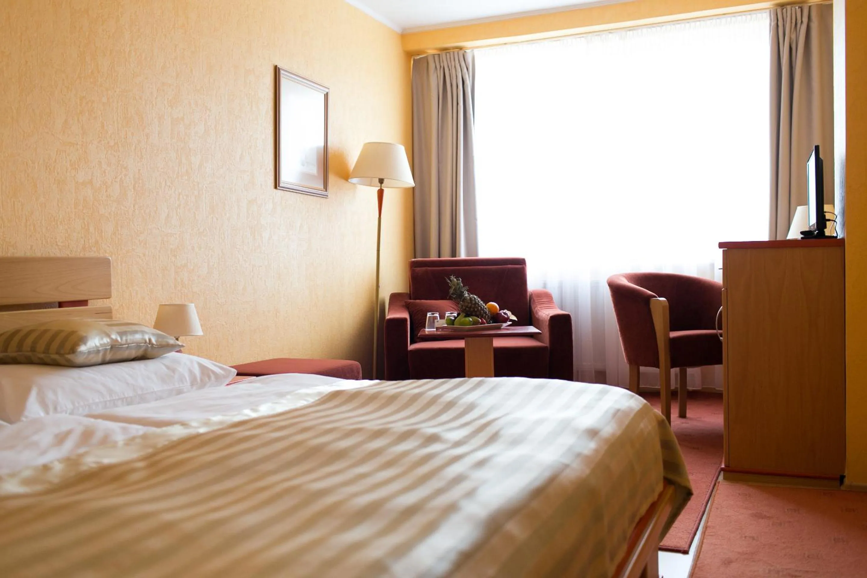 Photo of the whole room, Bed in Hotel Kormorán