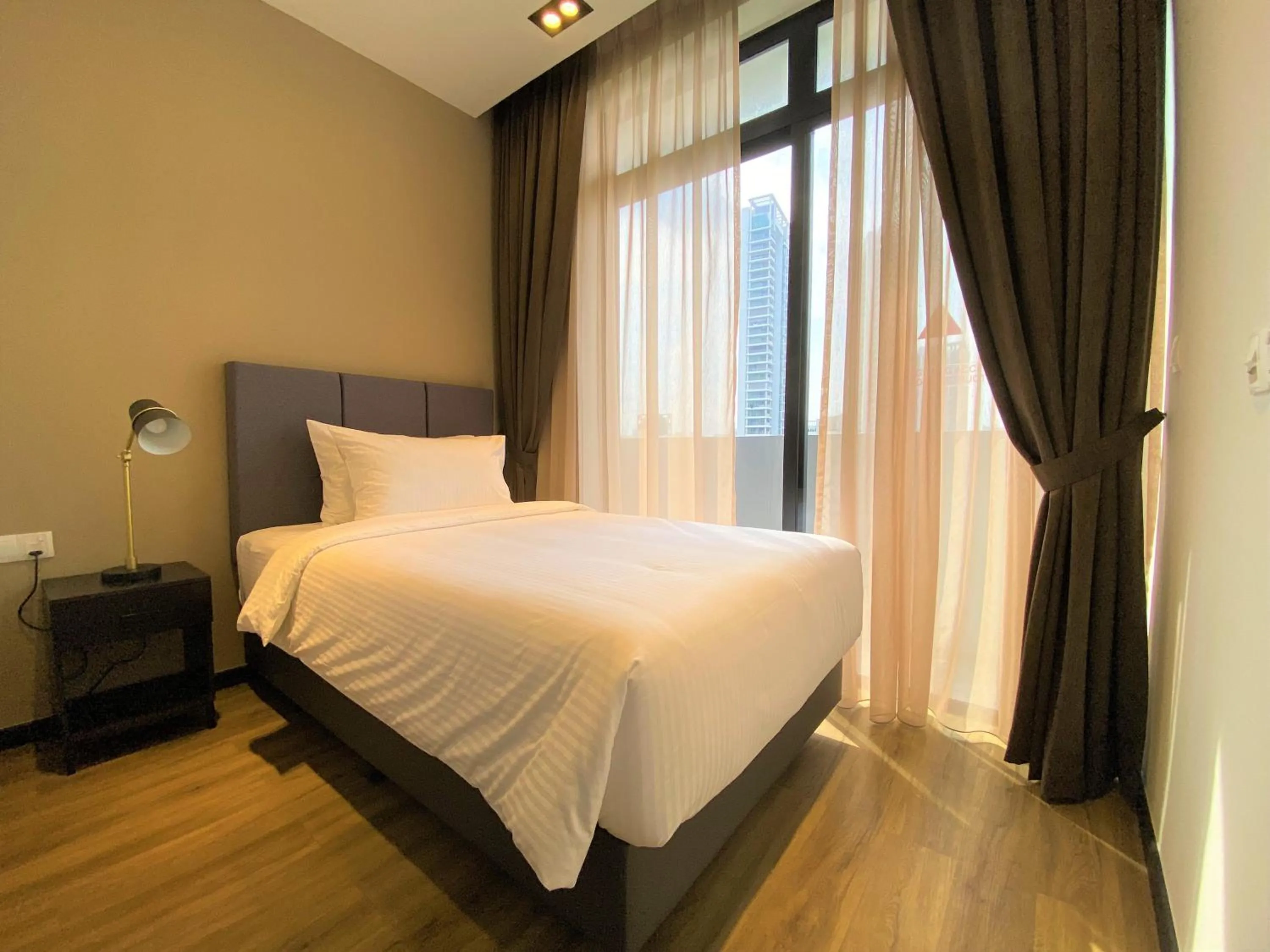 Bedroom in Momentus Serviced Residences Novena