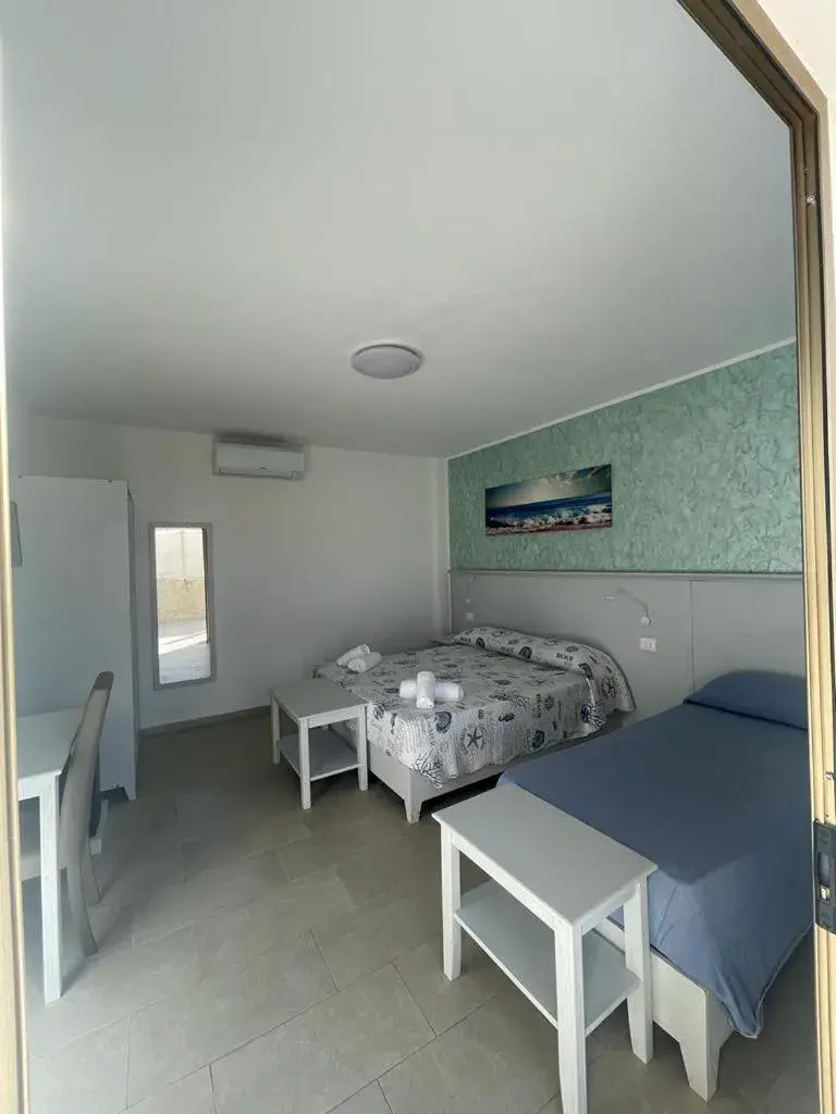 Deluxe Double Room (2 Adults + 1 Child) - single occupancy in La Tonnara B&B Deluxe Double Room (2 Adults + 1 Child) - single occupancy in La Tonnara B&B