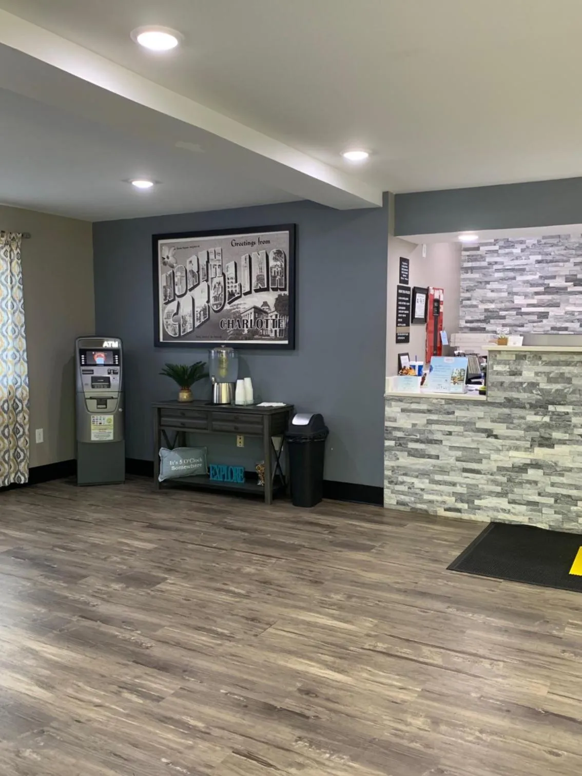 Communal lounge/ TV room in Super 8 by Wyndham Charlotte University